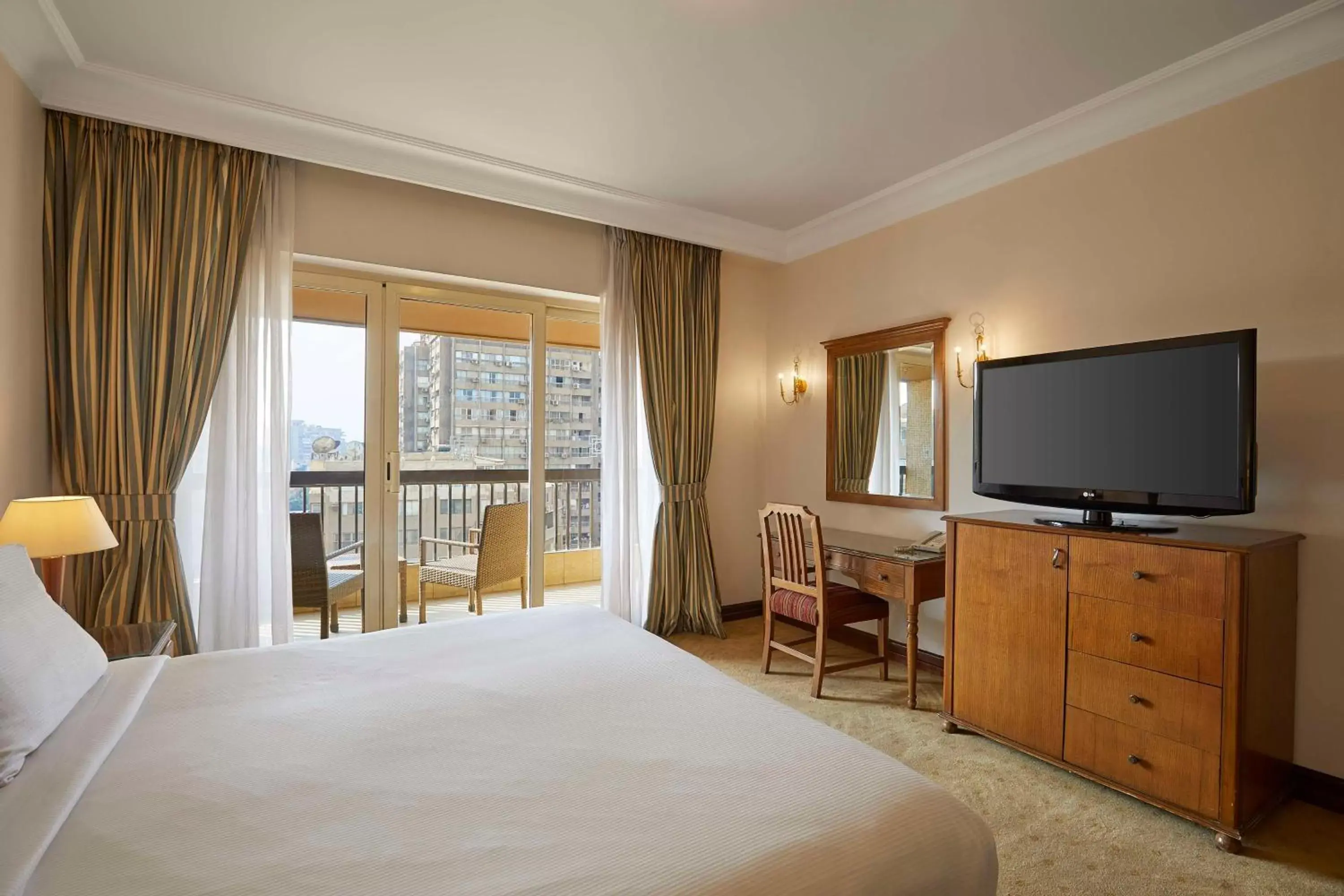 Bedroom, TV/Entertainment Center in Hilton Cairo Zamalek Residences