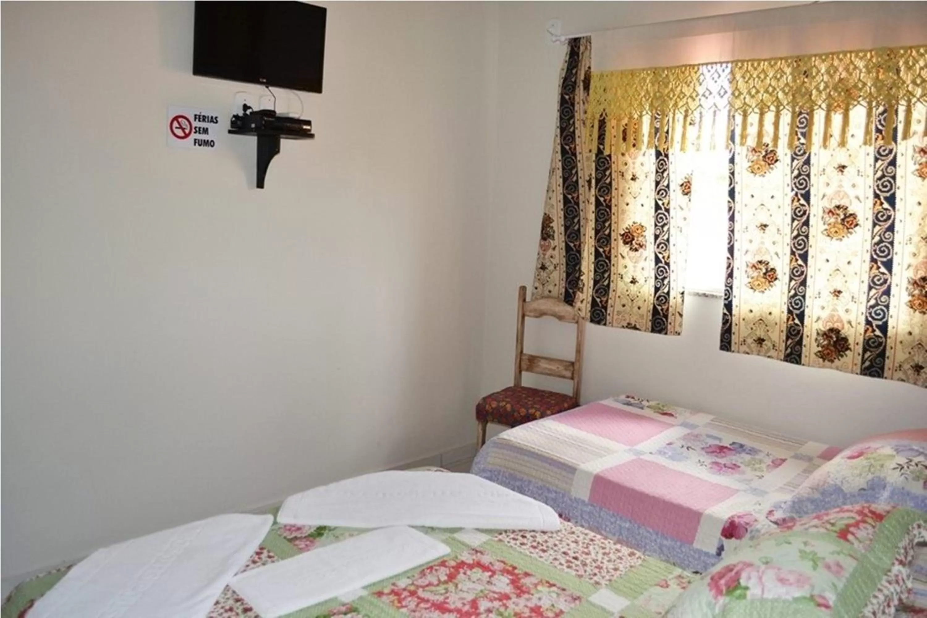 Bed in Pousada Miosotis