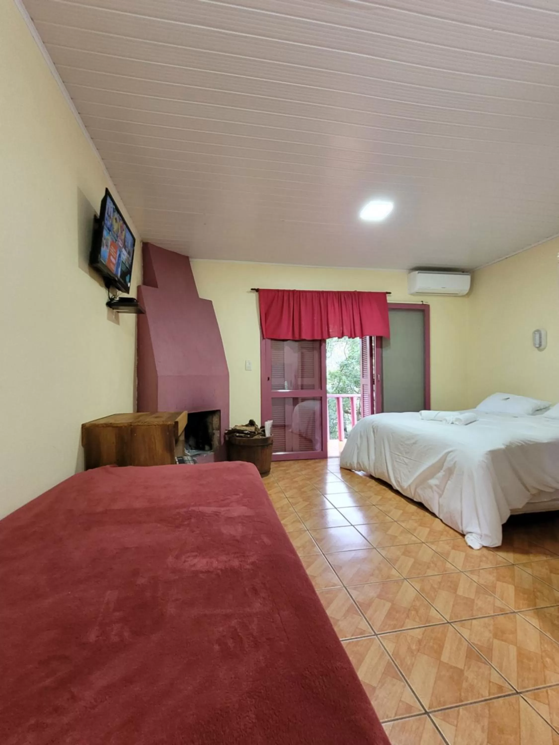 Bed in Pousada da Chacara