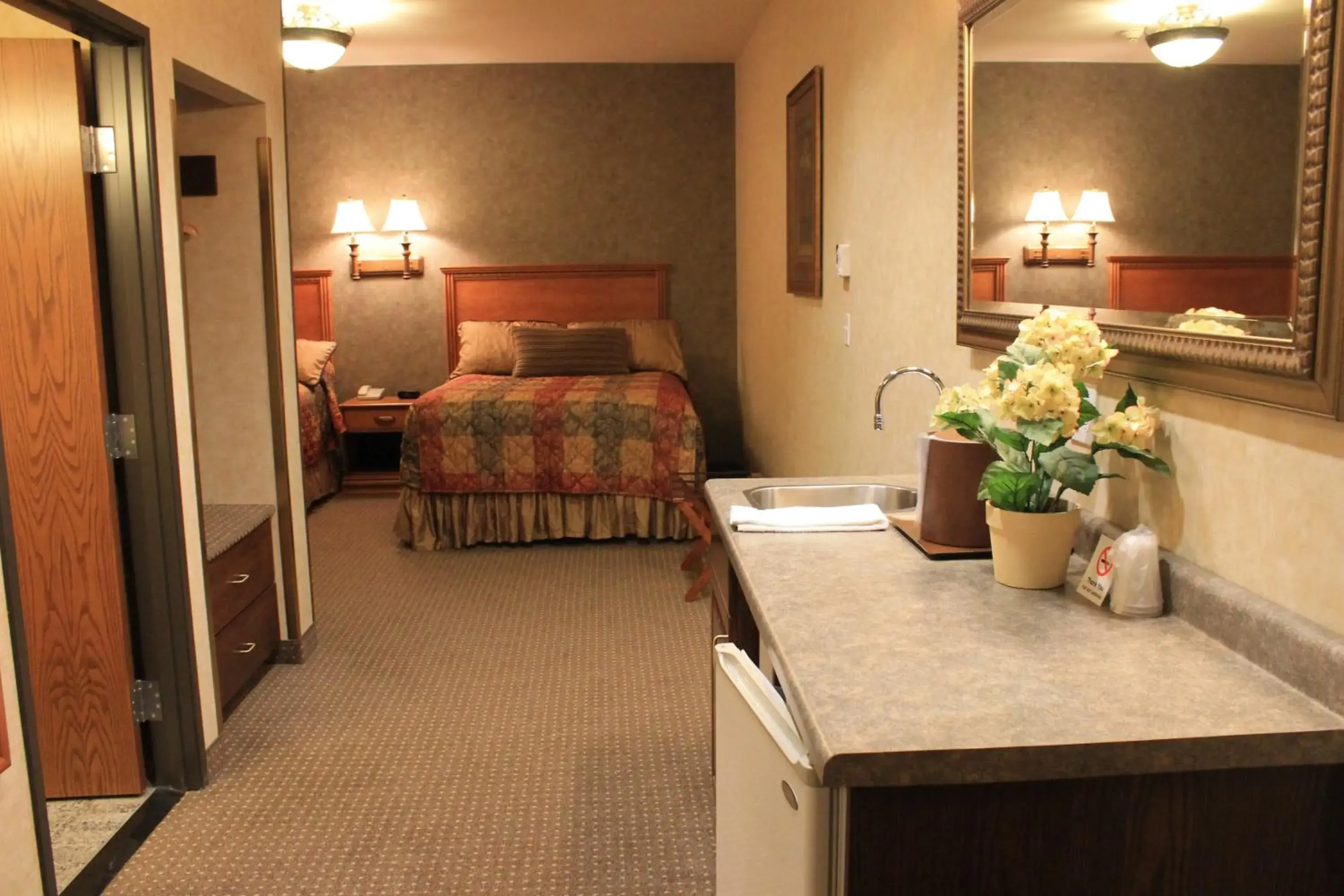 Bed in Rushmore Express & Suites