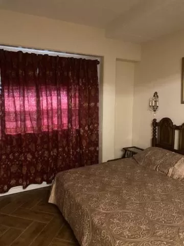 Bedroom in Capri Beach Hotel