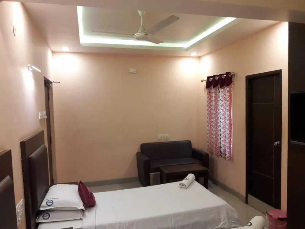 Bedroom in Hotel Ramco Residency A/c