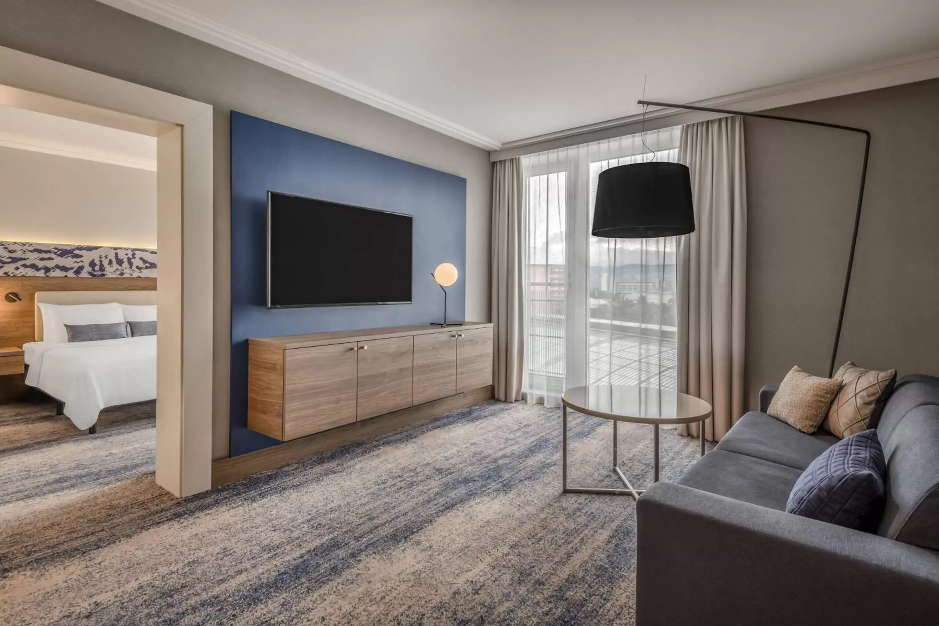 Living room, TV/Entertainment Center in Courtyard by Marriott Linz