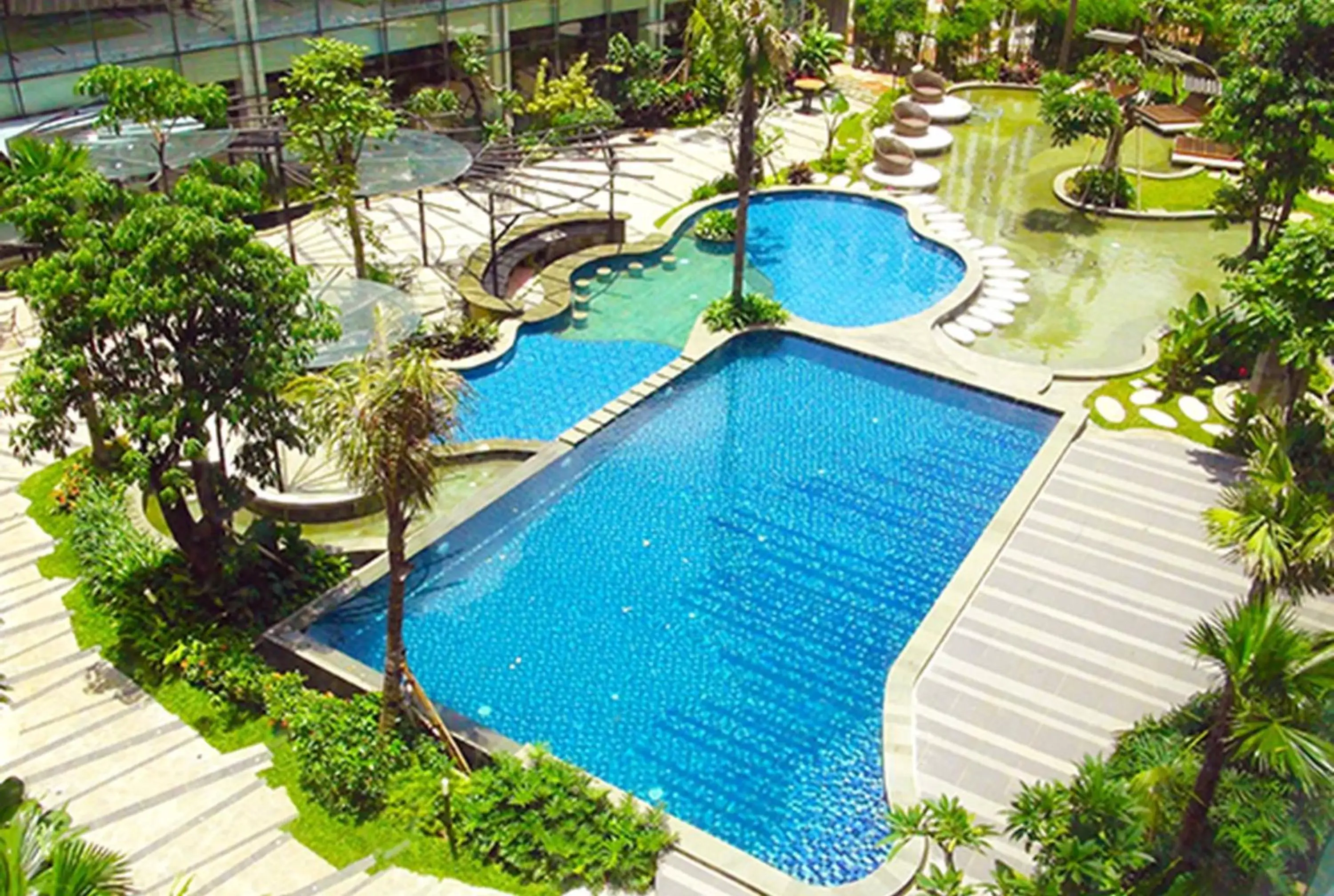 Swimming pool in Holiday Inn Cikarang Jababeka by IHG Swimming pool in Holiday Inn Cikarang Jababeka by IHG