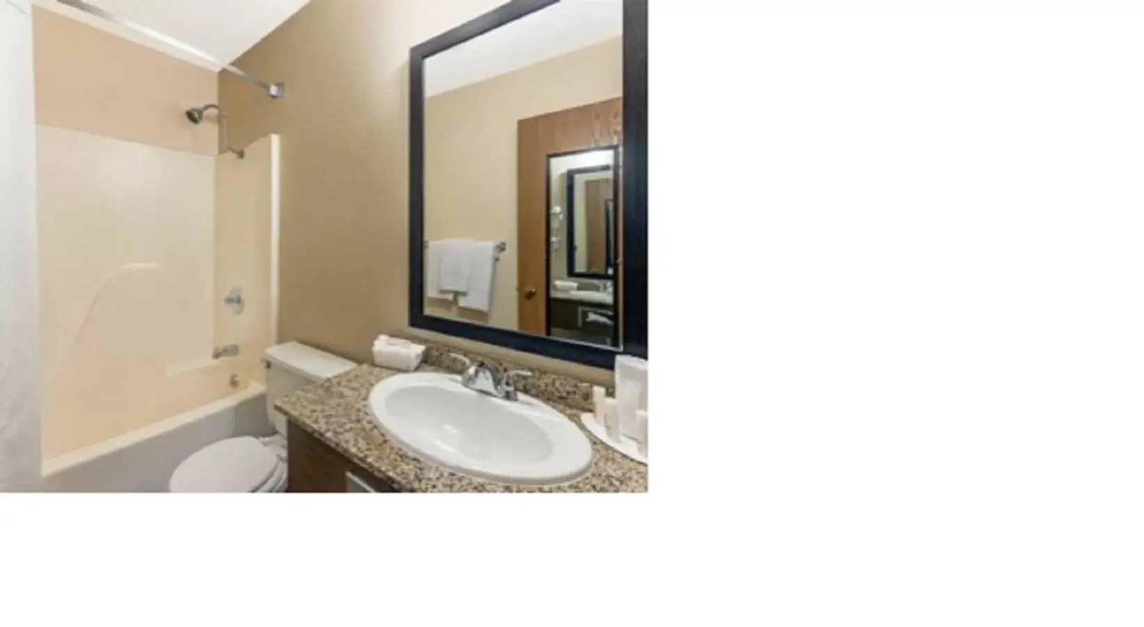 Bathroom in Super 8 by Wyndham Poplar Bluff Missouri