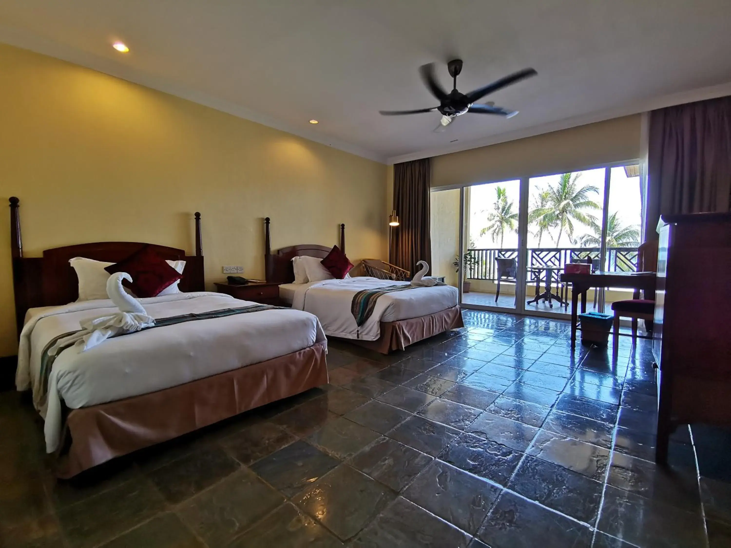 Bed in Palm Beach Resort & Spa