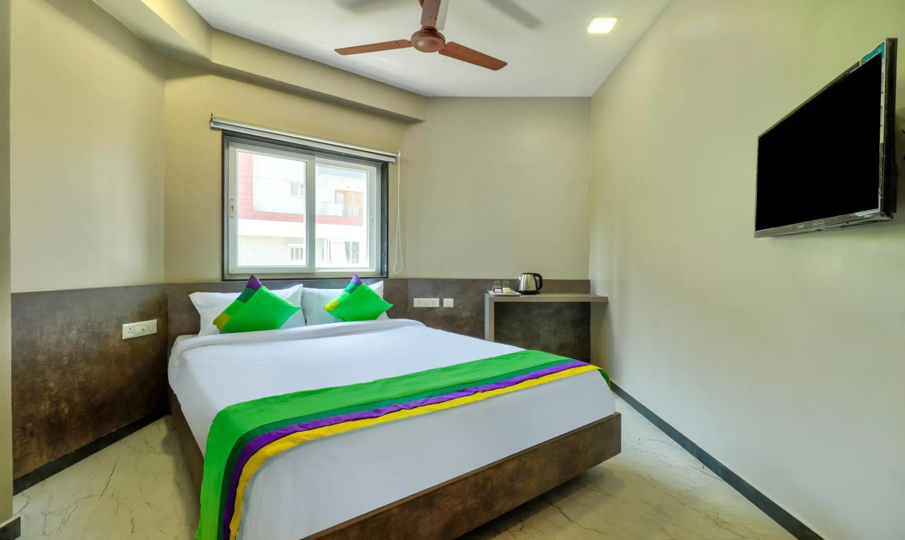 Standard Double Room - single occupancy in Treebo Sriz Cozy Seethamadhara Standard Double Room - single occupancy in Treebo Sriz Cozy Seethamadhara