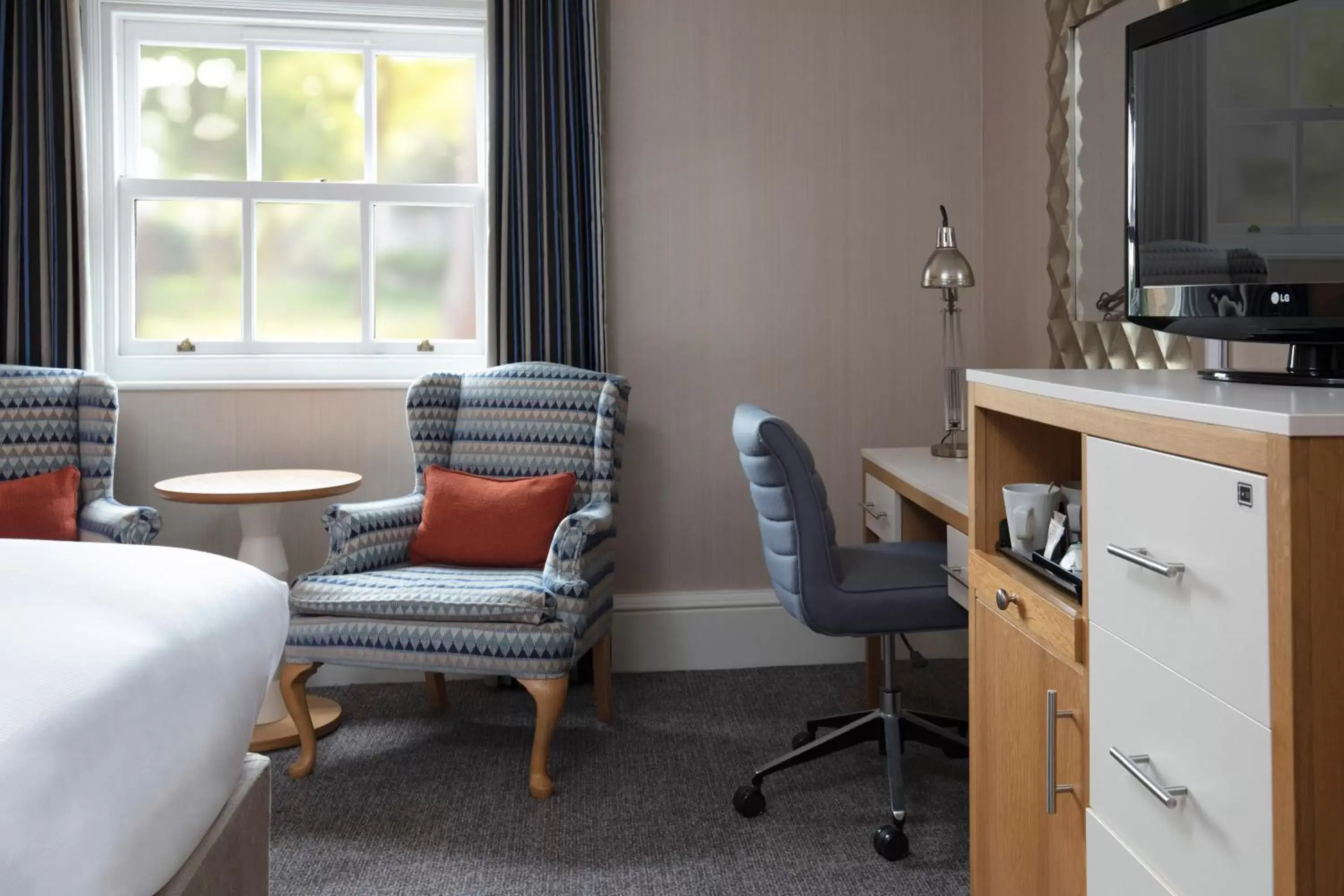 Bedroom, Seating Area in Oulton Hall Hotel, Spa & Golf Resort