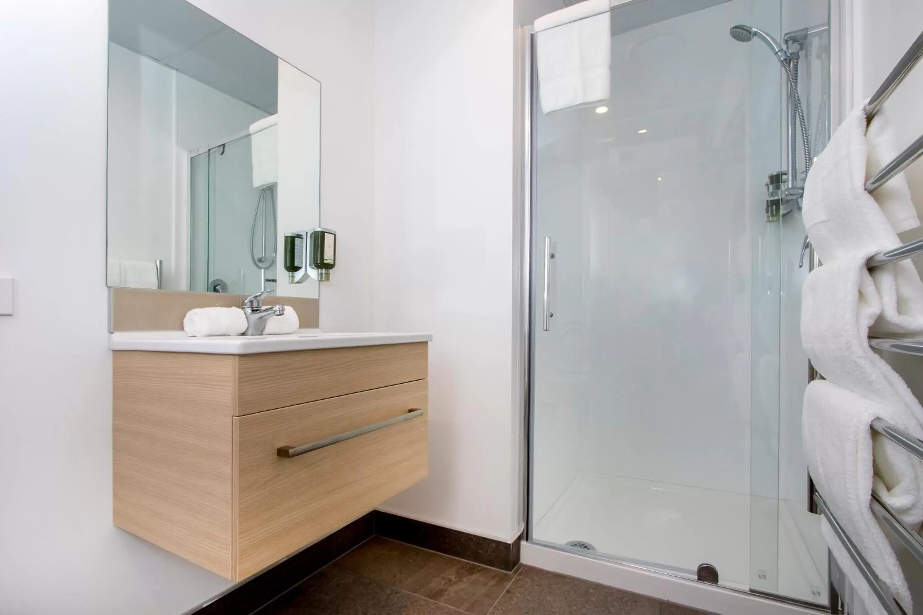 Bathroom in Ramada Suites by Wyndham Manukau
