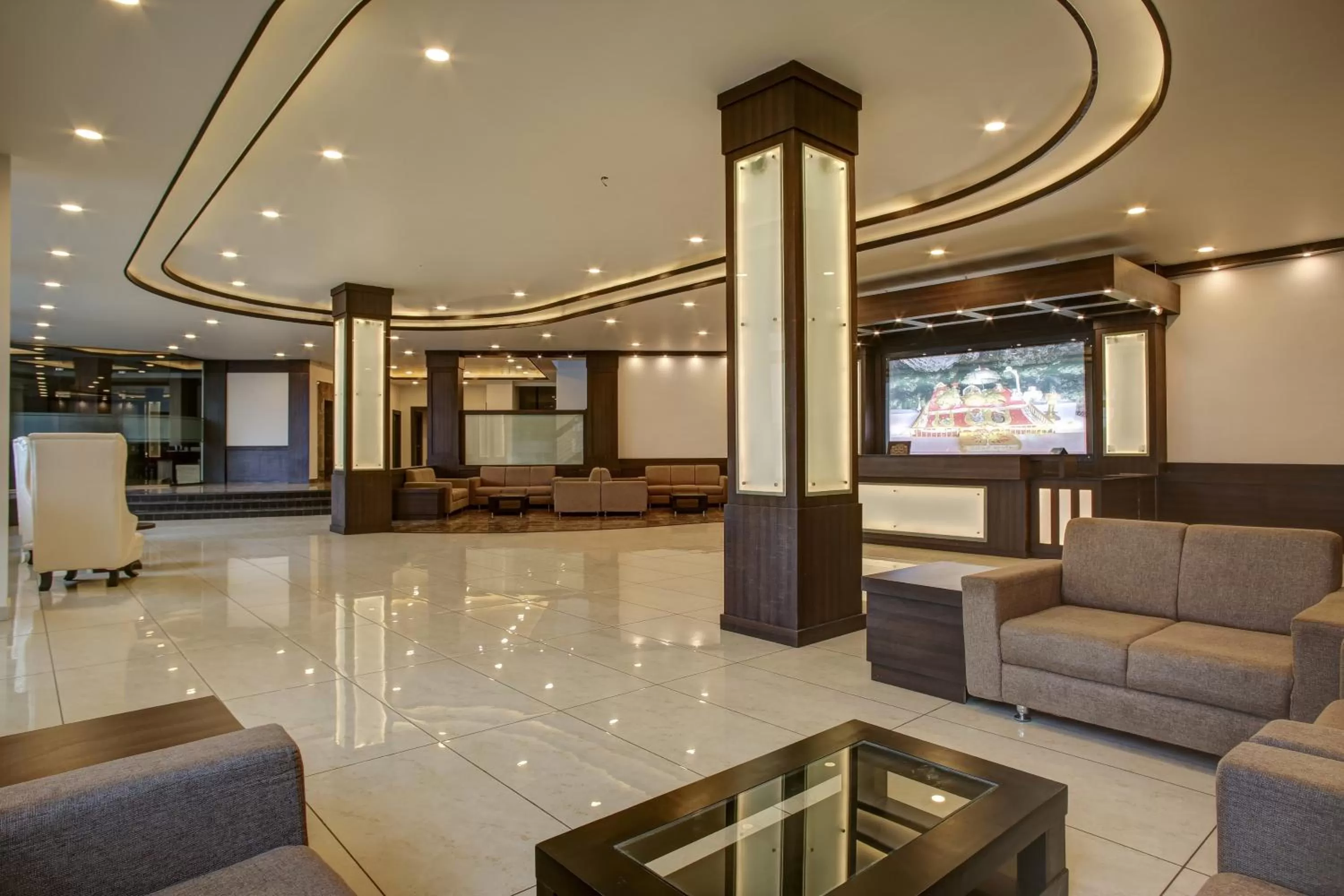Lobby or reception in Hotel The Royal Krishna