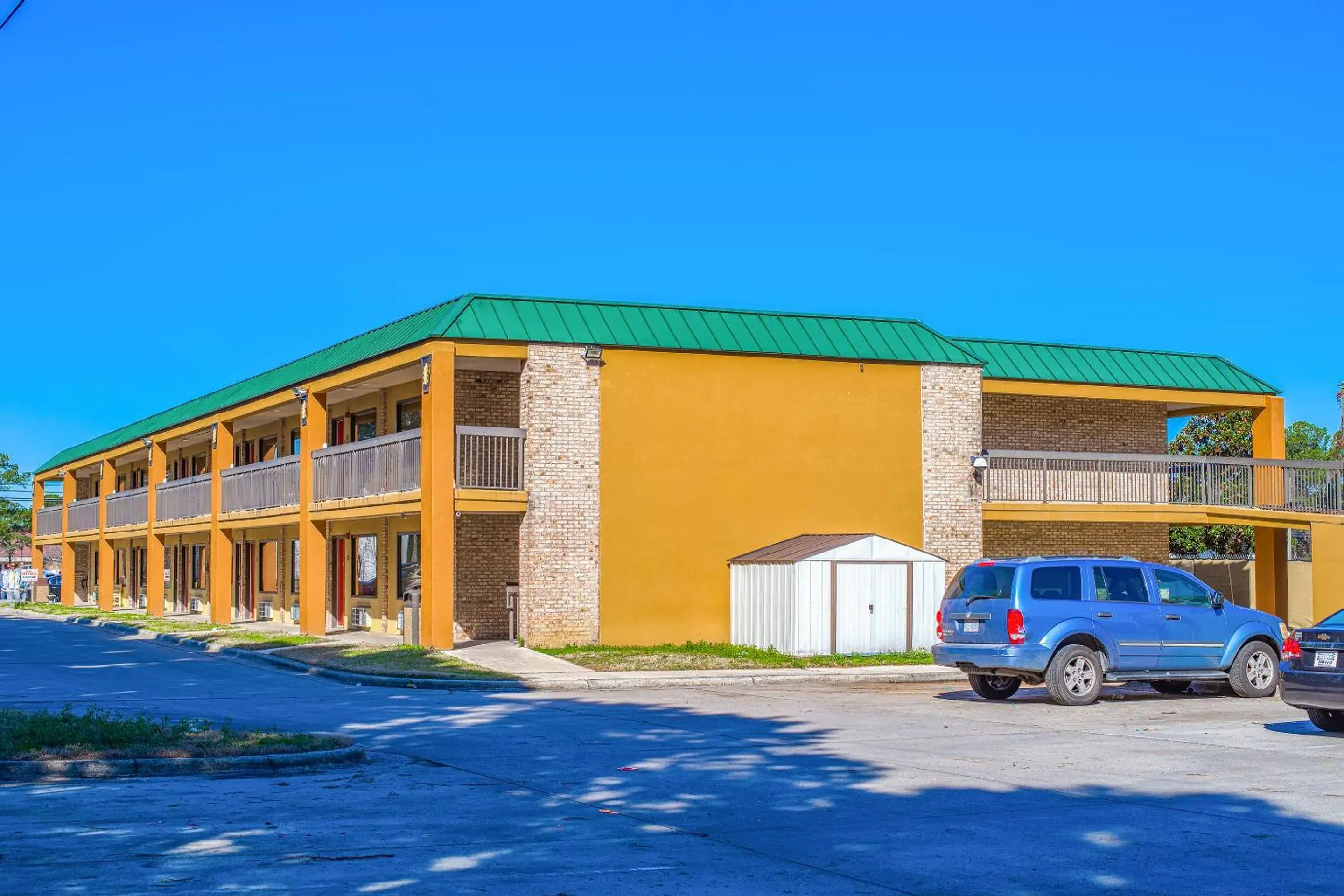 Parking, Property Building in Mayfair Inn by OYO Williamston Hwy 64