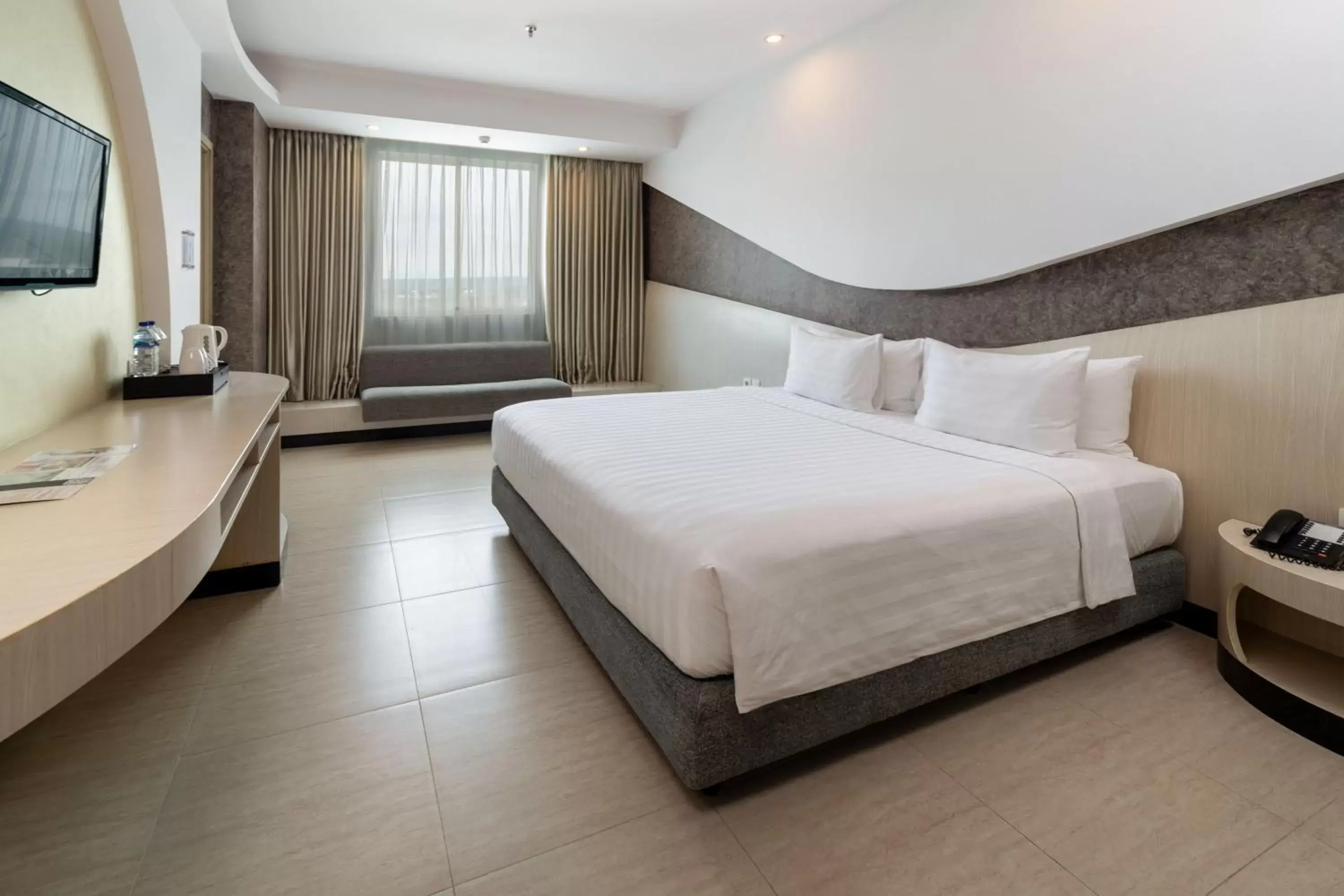 Photo of the whole room, Bed in ASTON Cirebon Hotel and Convention Center