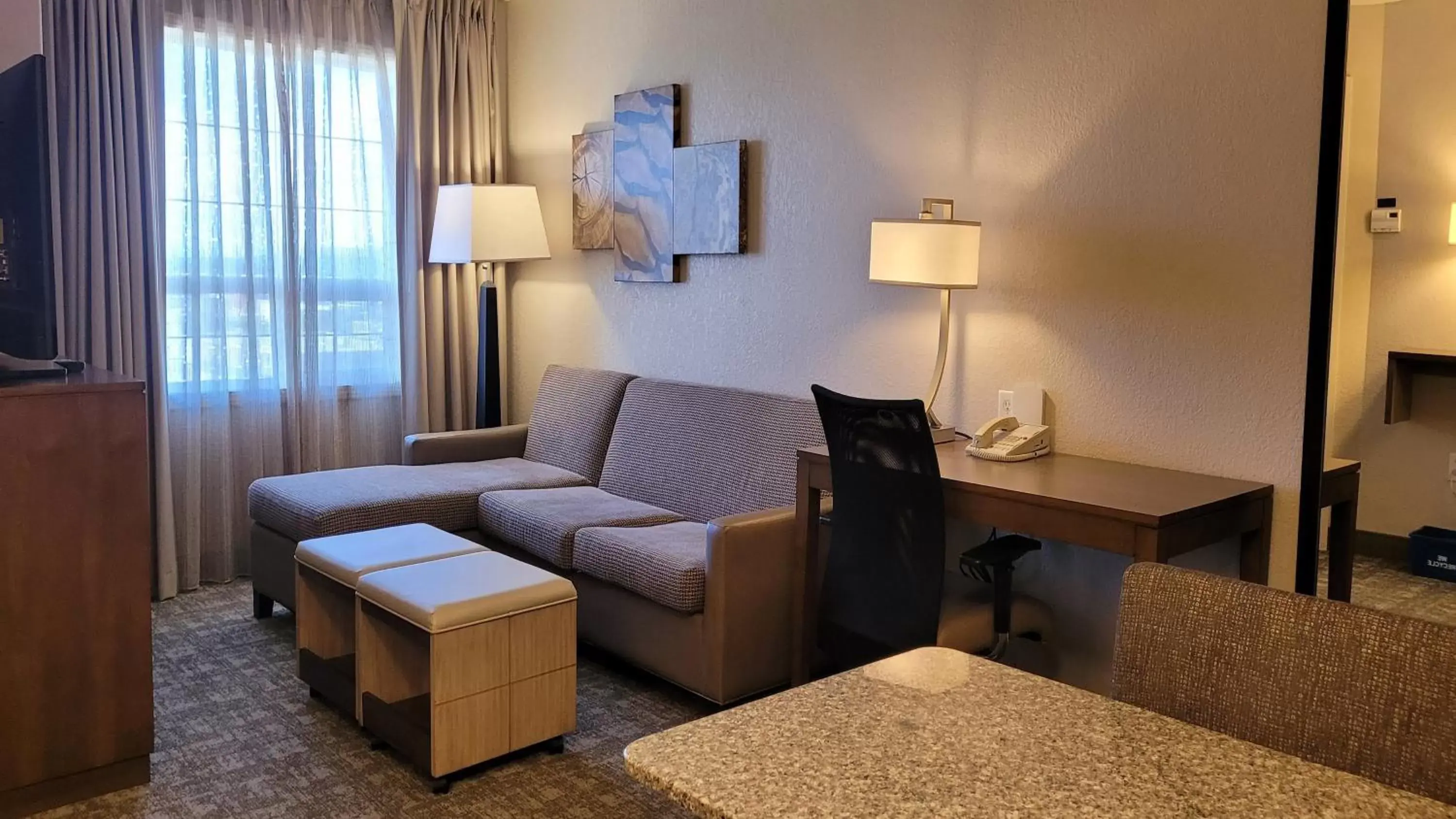 Photo of the whole room, Seating Area in Staybridge Suites - Calgary Airport, an IHG Hotel