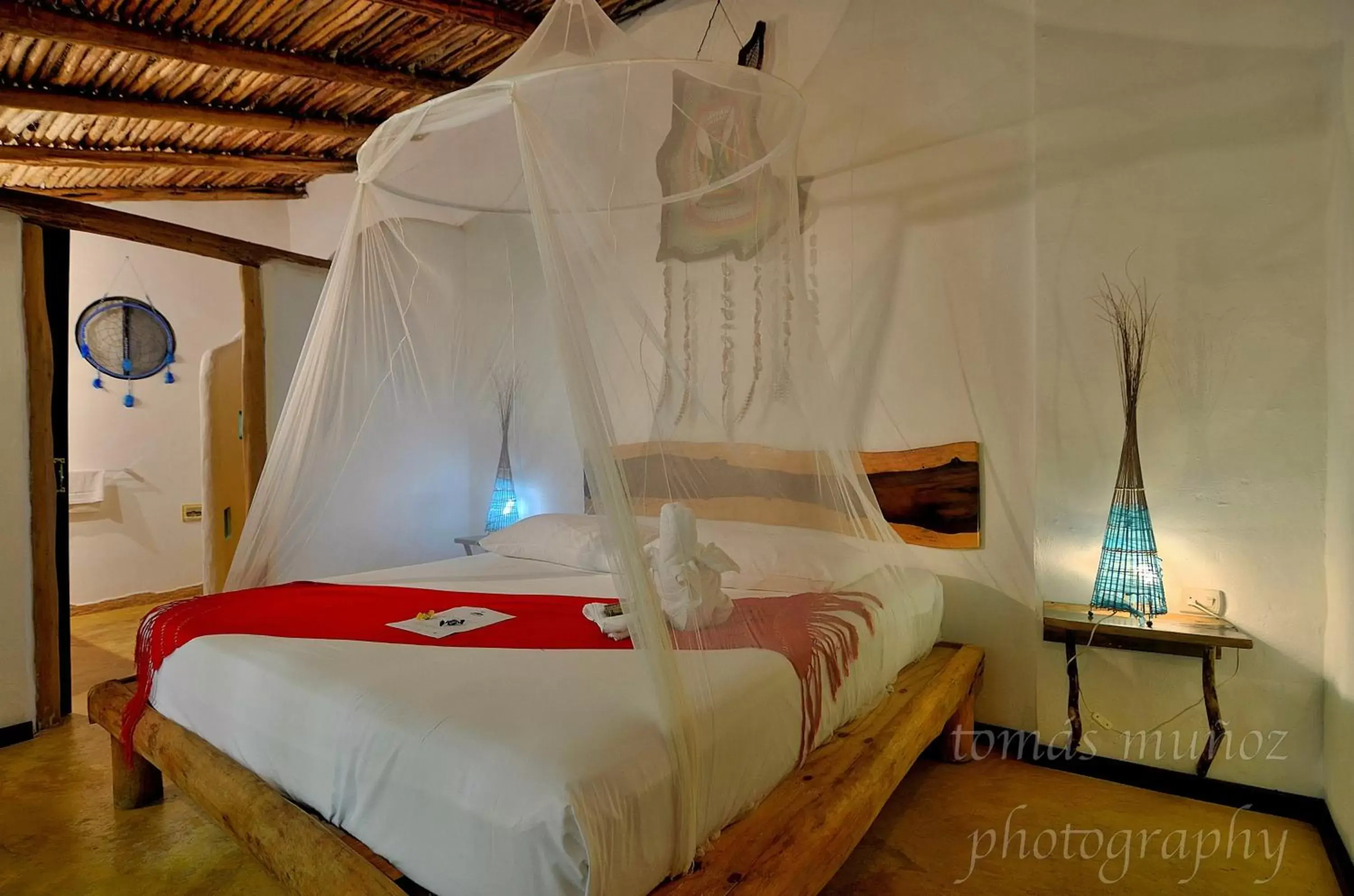 Photo of the whole room, Bed in Pacha Tulum Boutique Hotel