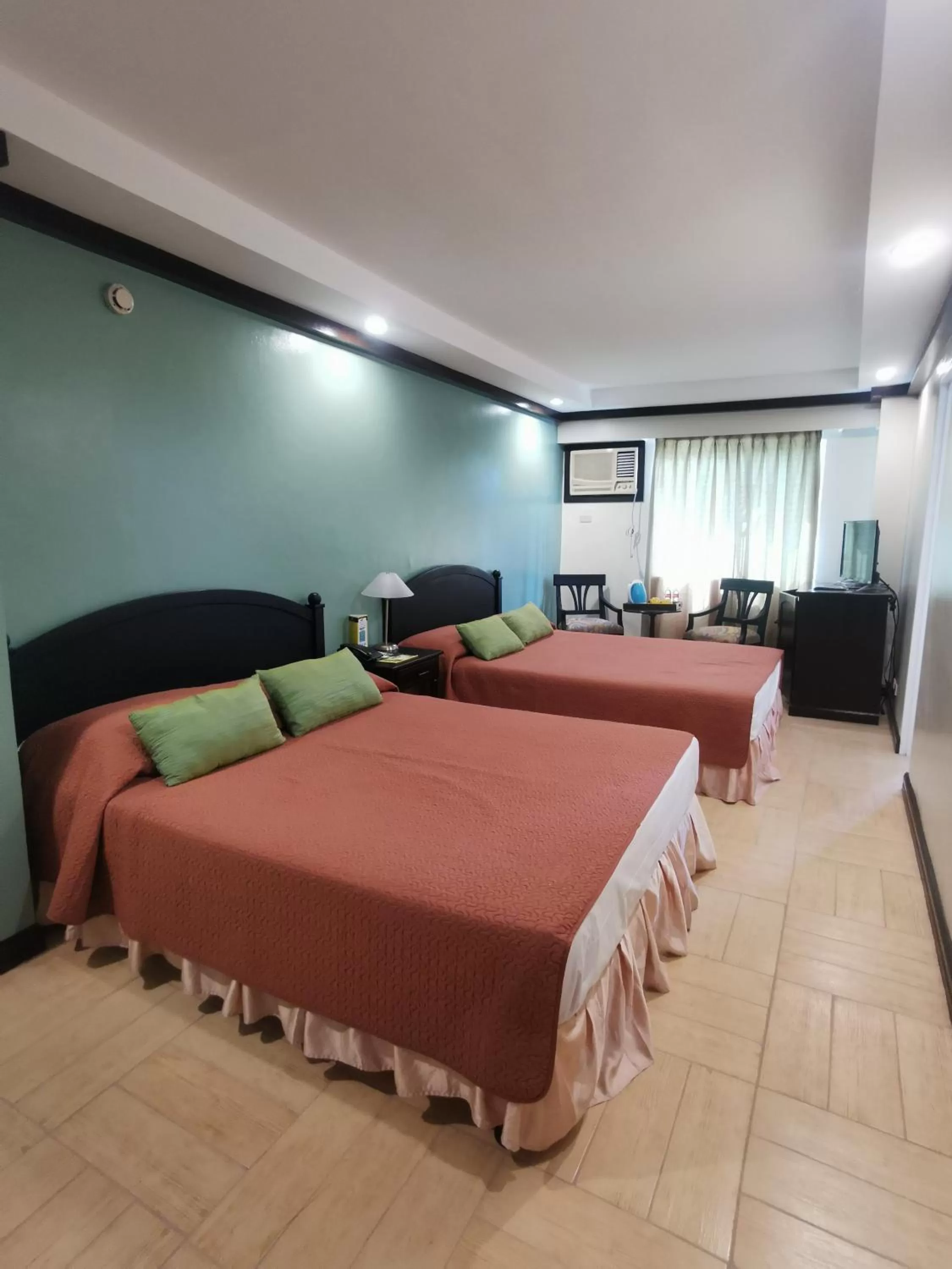 Bed in Tagaytay Country Hotel