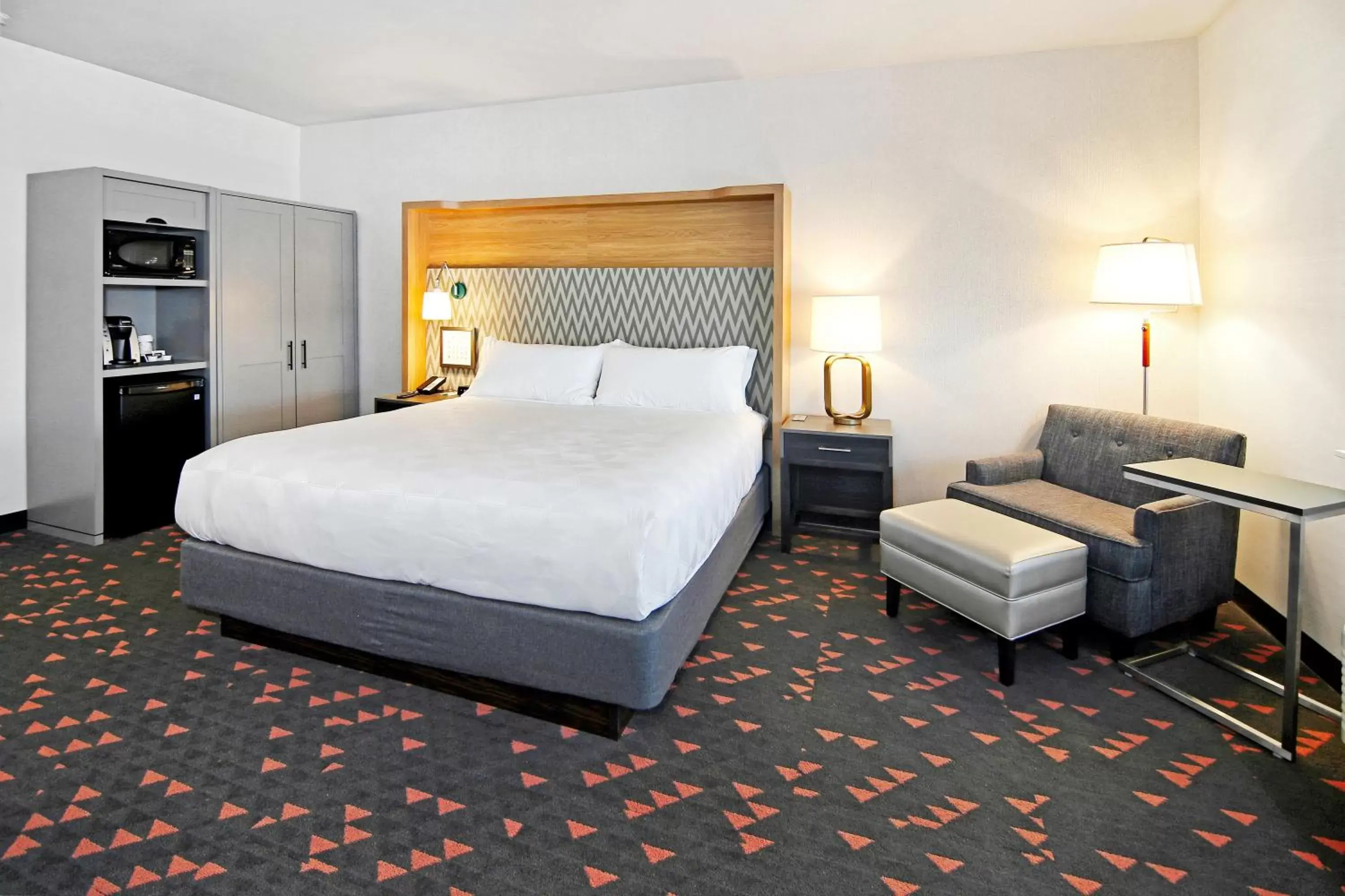 Photo of the whole room, Bed in Holiday Inn Hotel & Suites - Calgary Airport North, an IHG Hotel