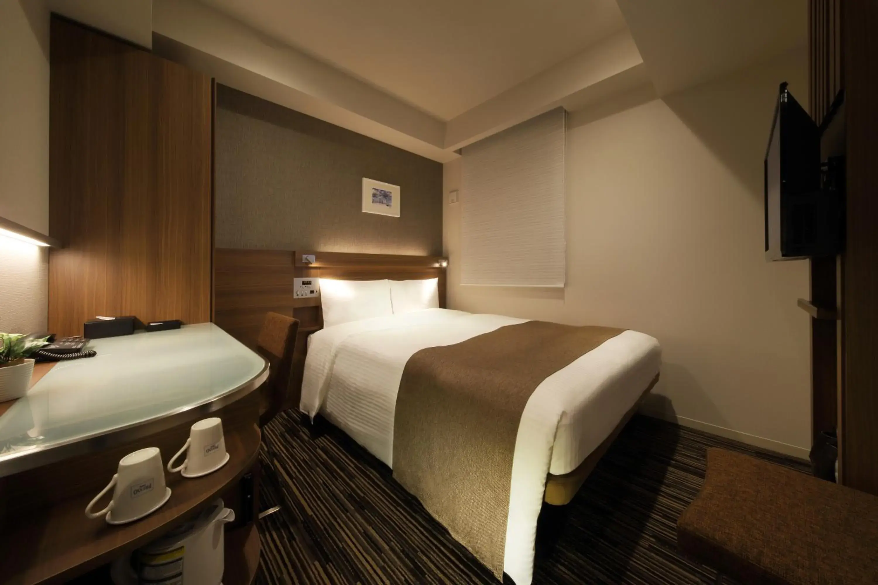 Bed in Keio Presso Inn Hamamatsucho Bed in Keio Presso Inn Hamamatsucho