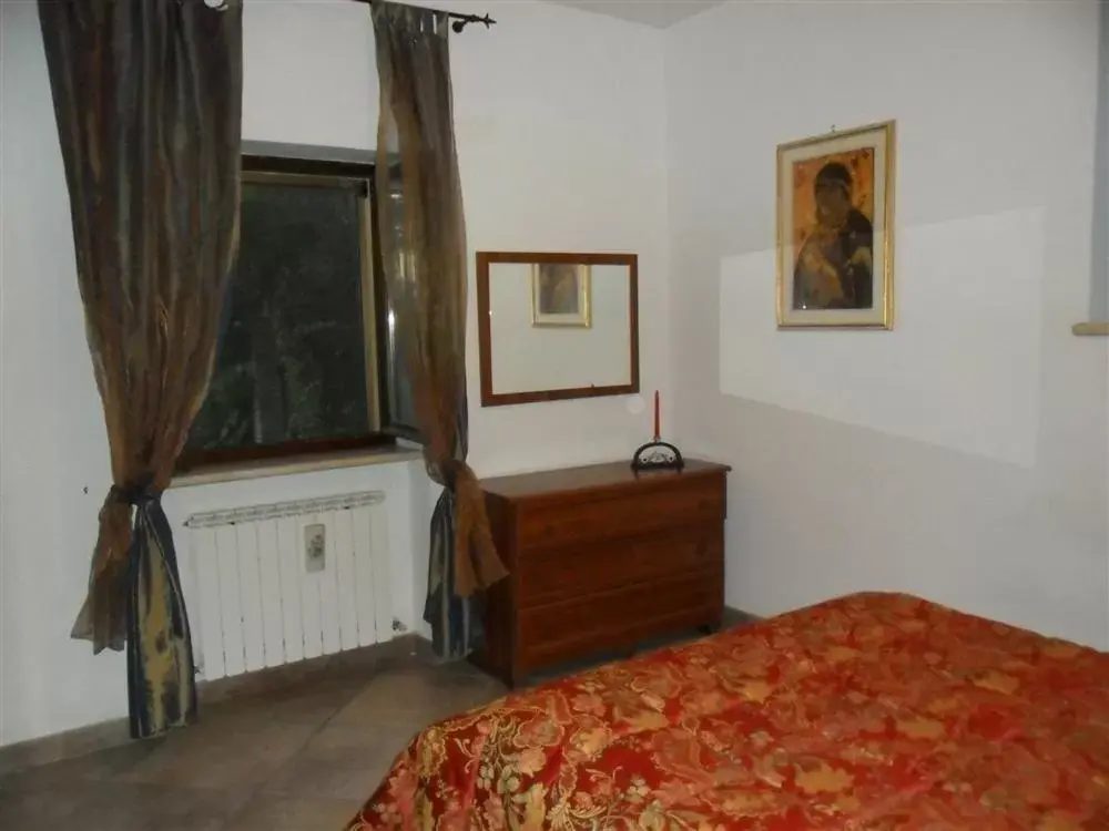 Photo of the whole room, Bed in La Cinci Allegra
