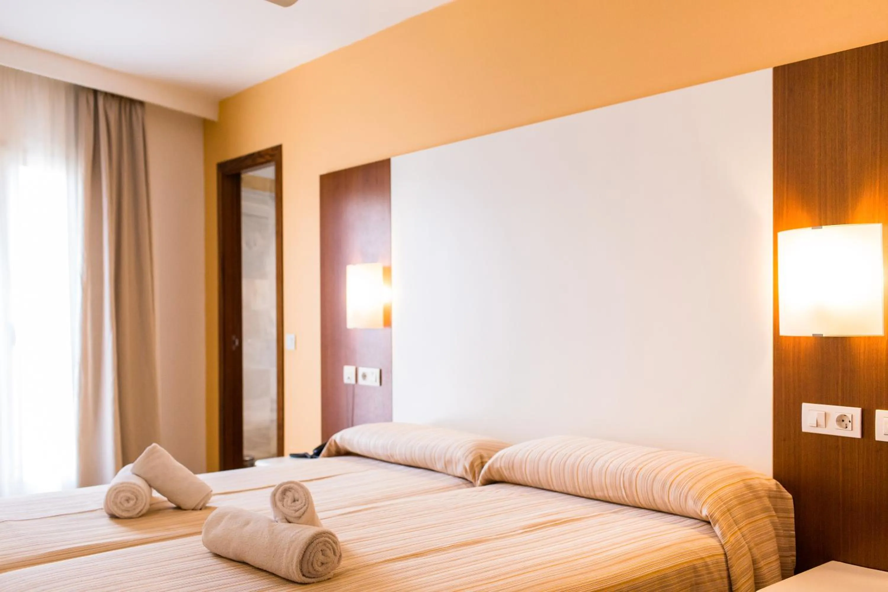 Photo of the whole room, Bed in Sagitario Hostal Ciutadella