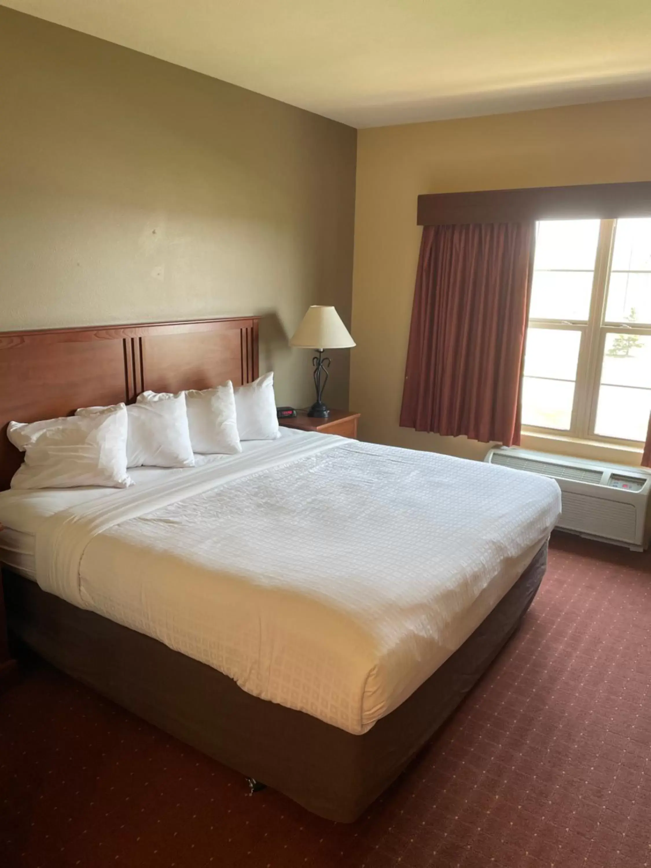 Photo of the whole room, Bed in AmericInn by Wyndham Fargo Medical Center