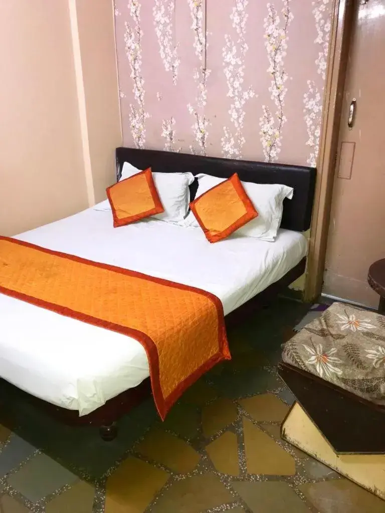 Bed in Kailash Hotel Bed in Kailash Hotel