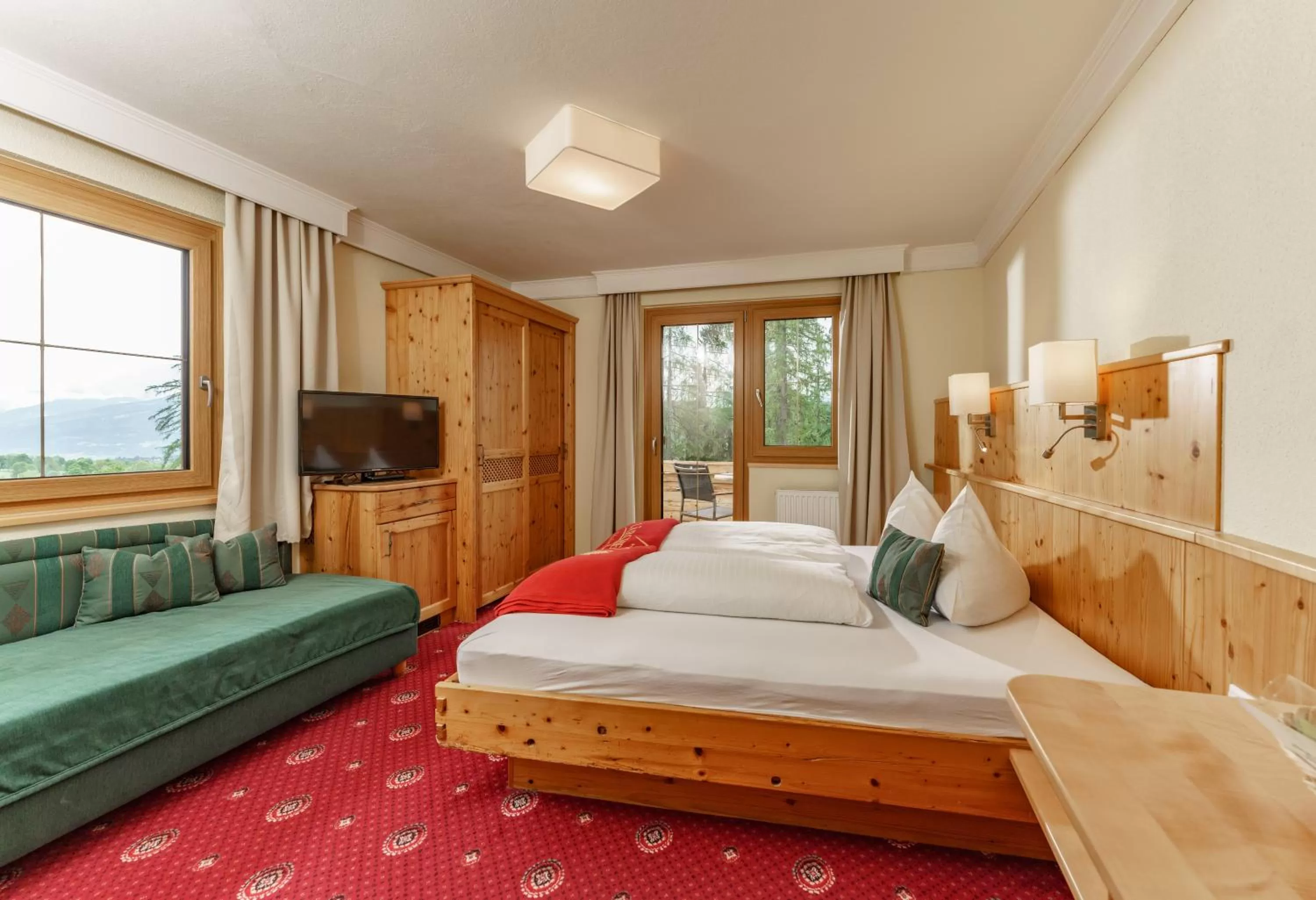 Photo of the whole room, Bed in Naturhotel Lärchenhof