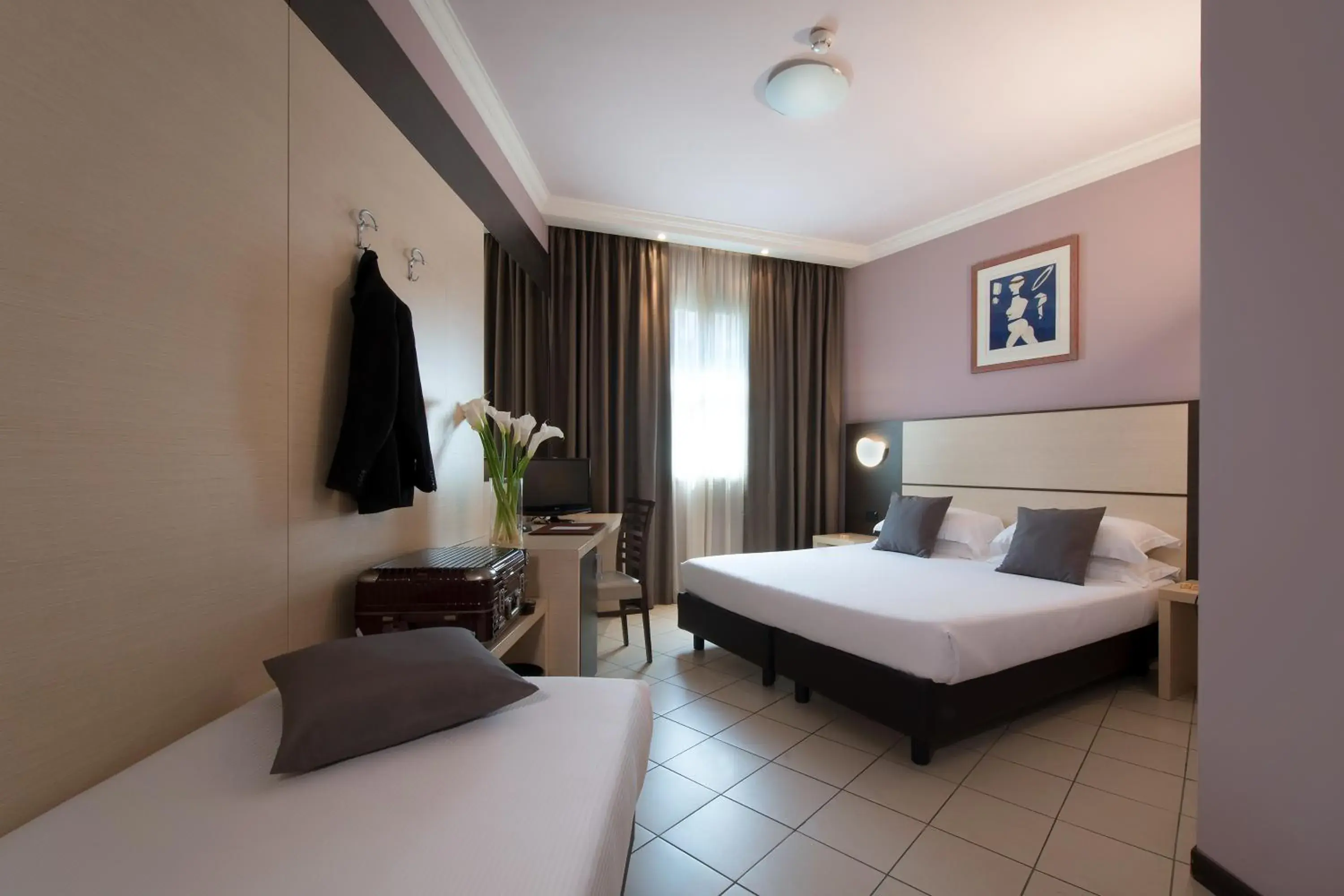 Bedroom in CDH Hotel La Spezia