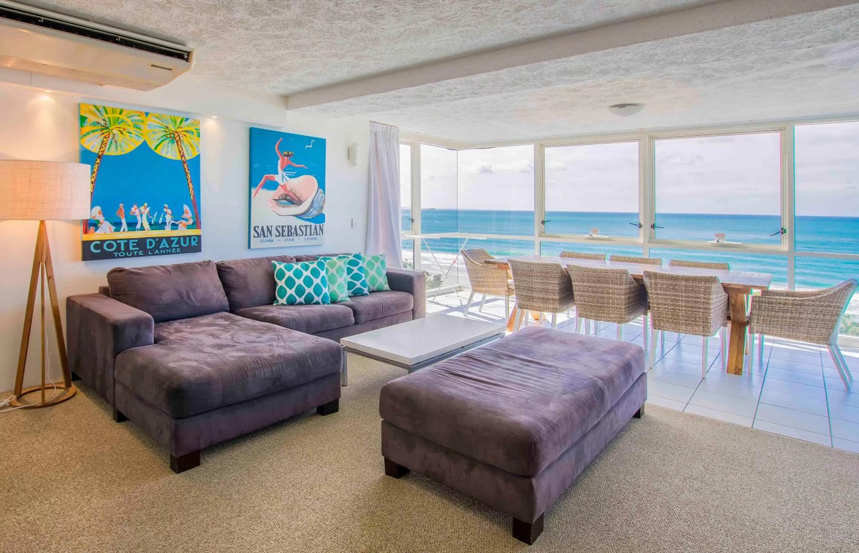 Seating area, Bed in 84 The Spit Holiday Apartments