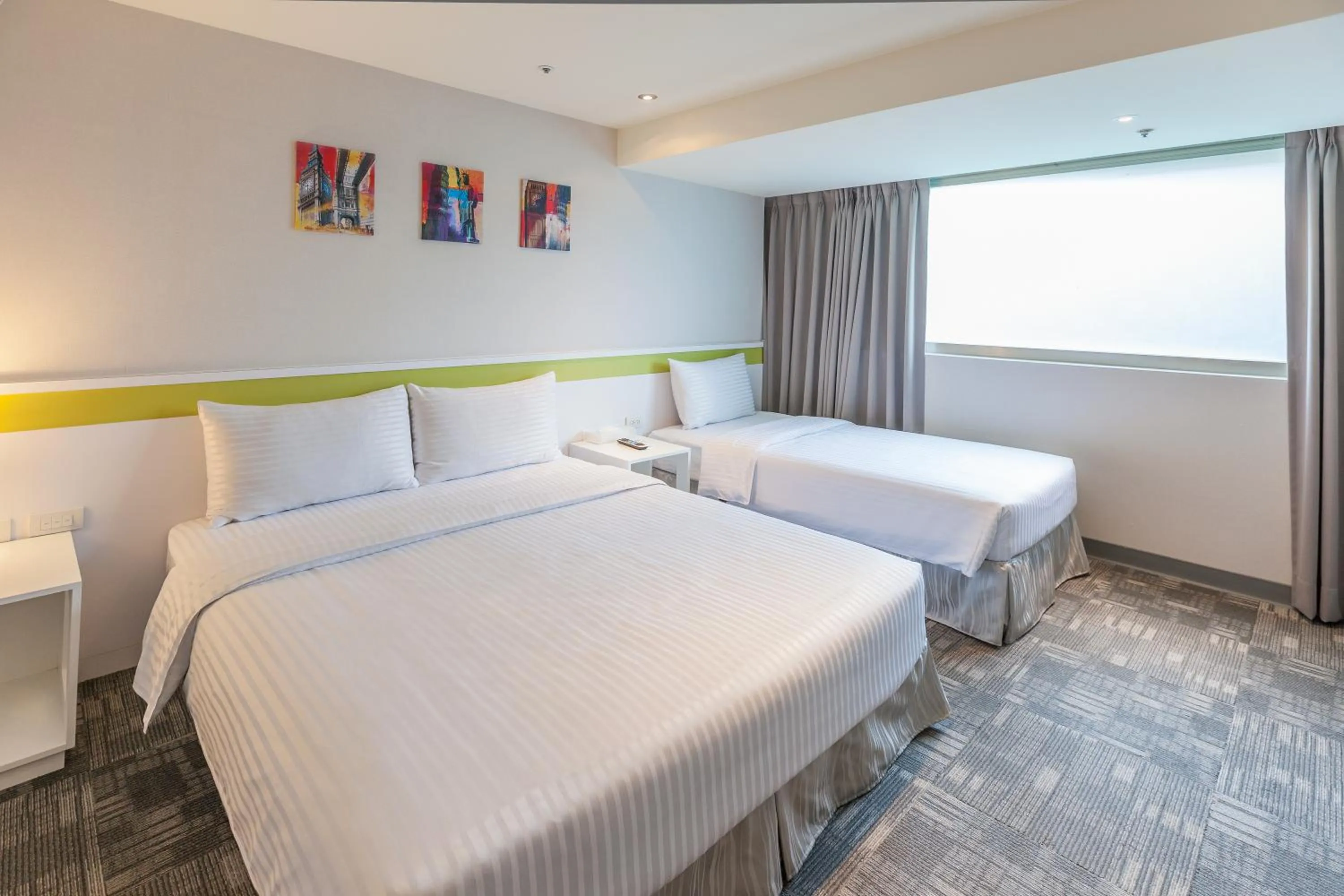 Deluxe Triple Room in 9ine Hotel