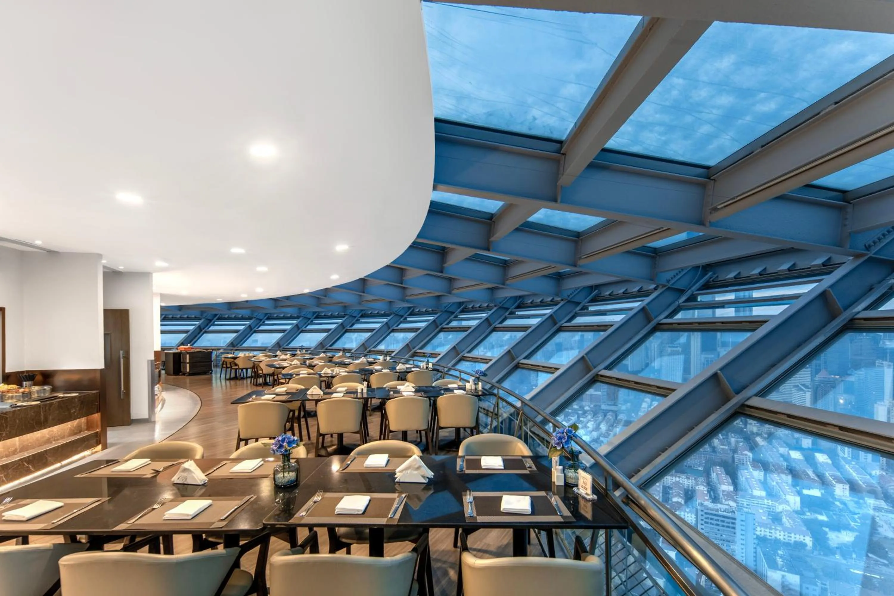 Buffet breakfast in Novotel Atlantis Shanghai - Enjoy our great-valued breakfast in our rooftop revolving restaurant with a stunning river view & utilize our FREE self-serviced laundry