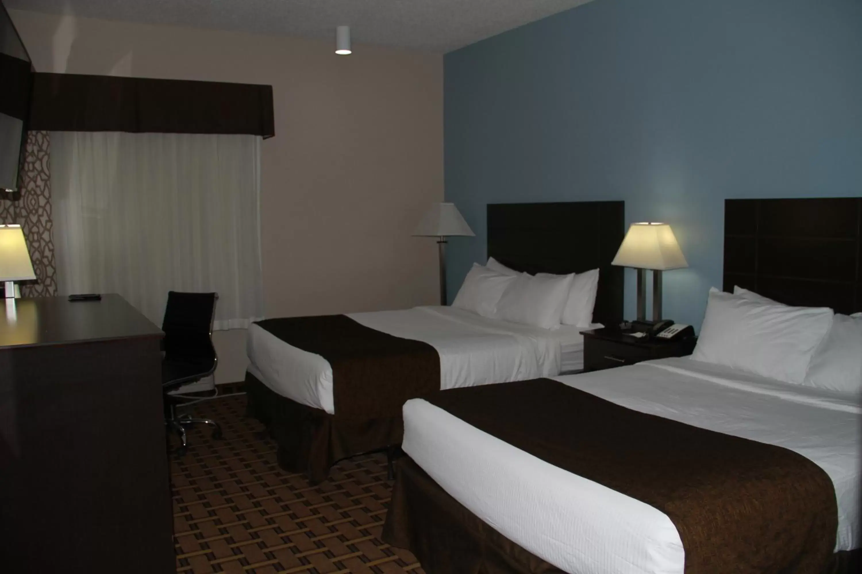 Bedroom, Bed in SureStay Plus Hotel by Best Western Coralville Iowa City