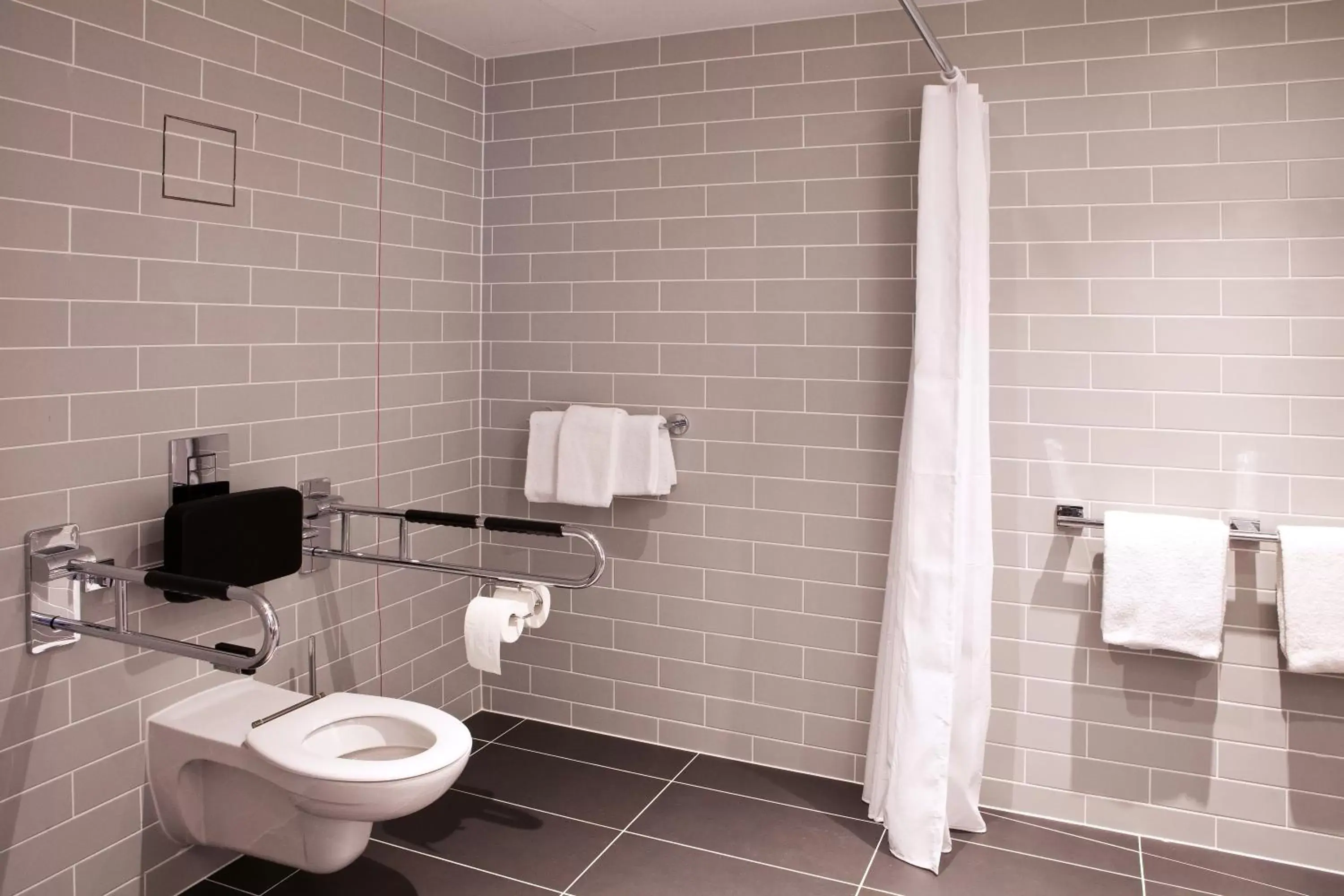 Toilet, Bathroom in Holiday Inn Express - Darmstadt, an IHG Hotel