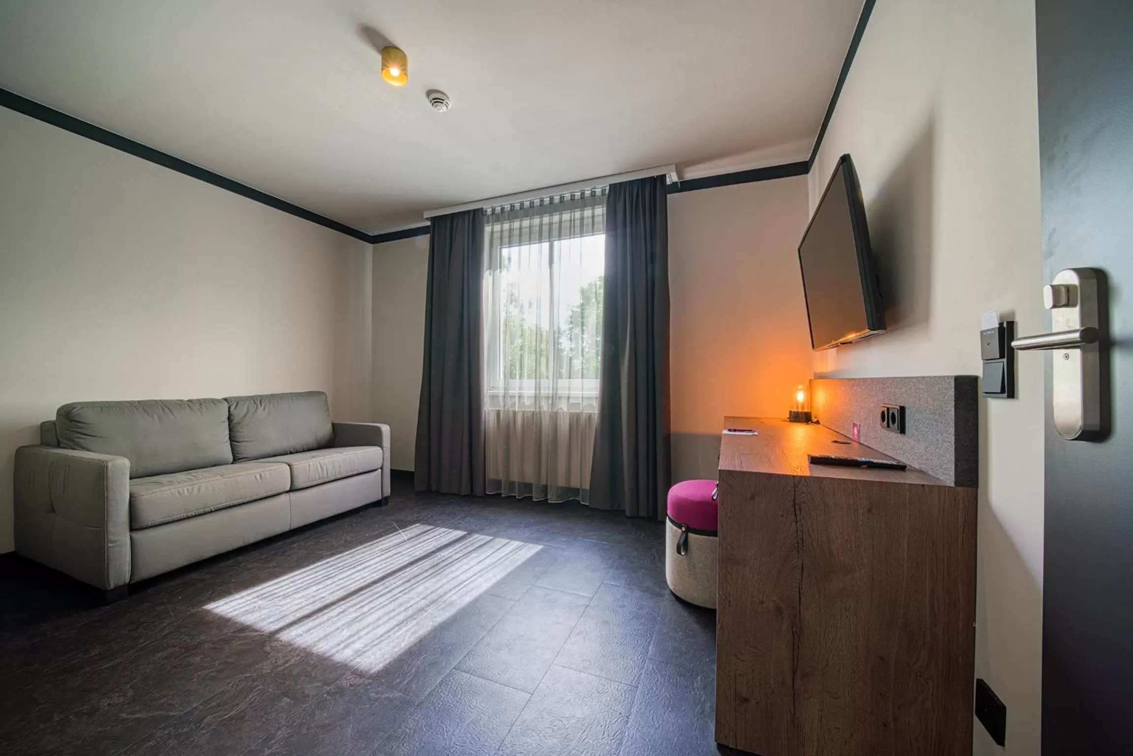 Photo of the whole room in FourSide Hotel Salzburg Messe, Trademark Collection by Wyndham