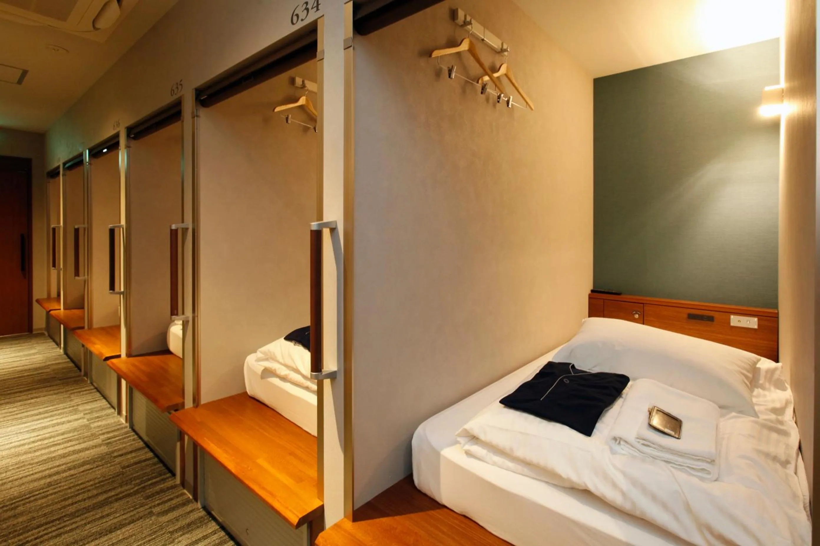 Bed in Gardens Cabin