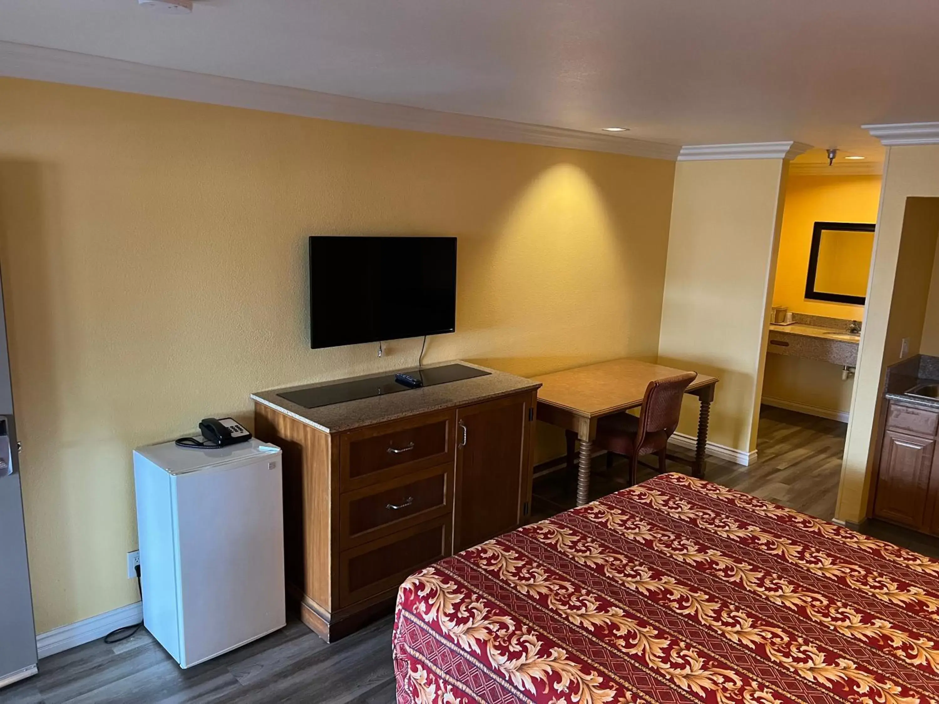 Bed in Industry Inn & Suites Bed in Industry Inn & Suites