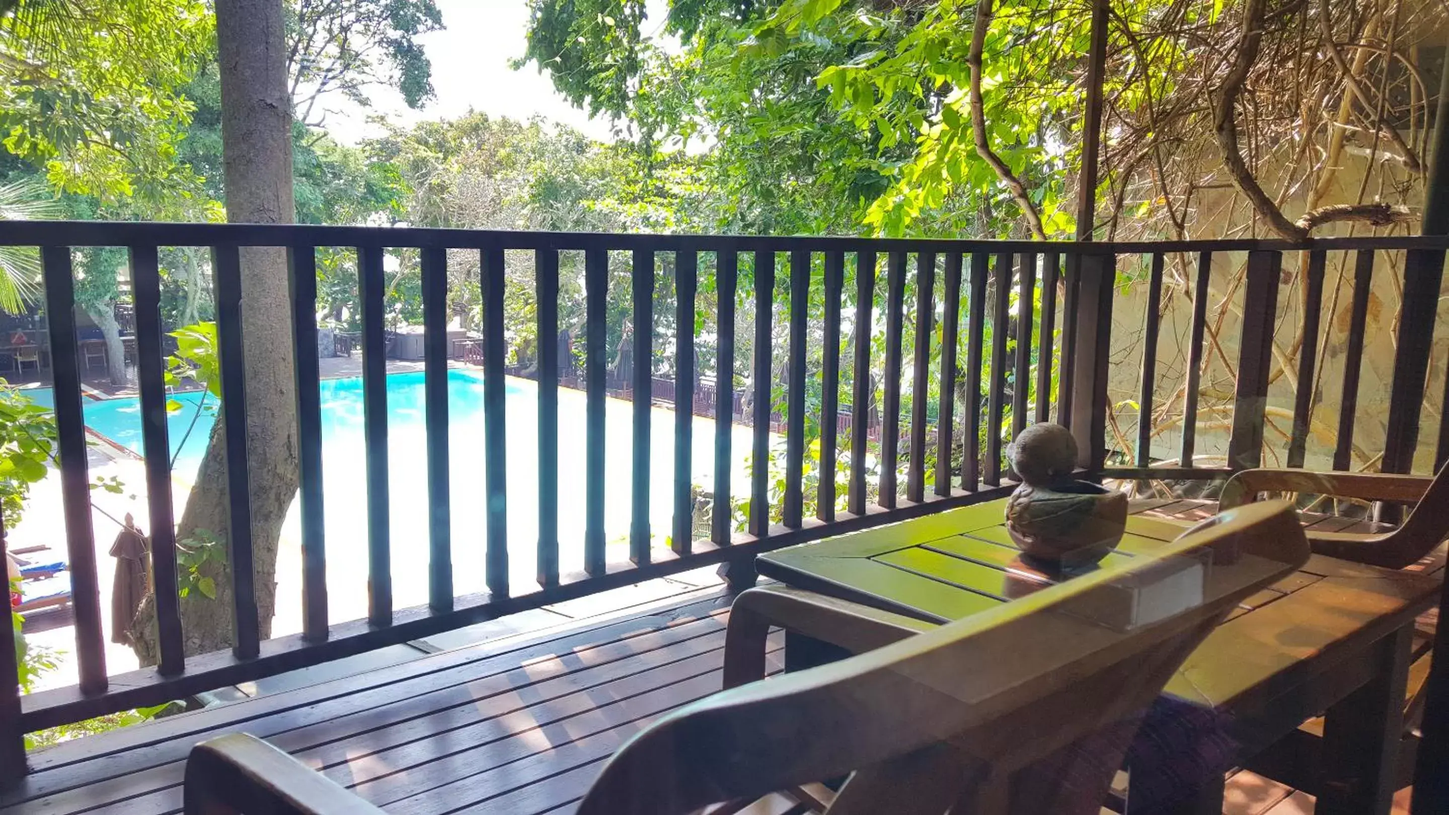 Balcony/Terrace, Pool View in Birds and Bees Resort