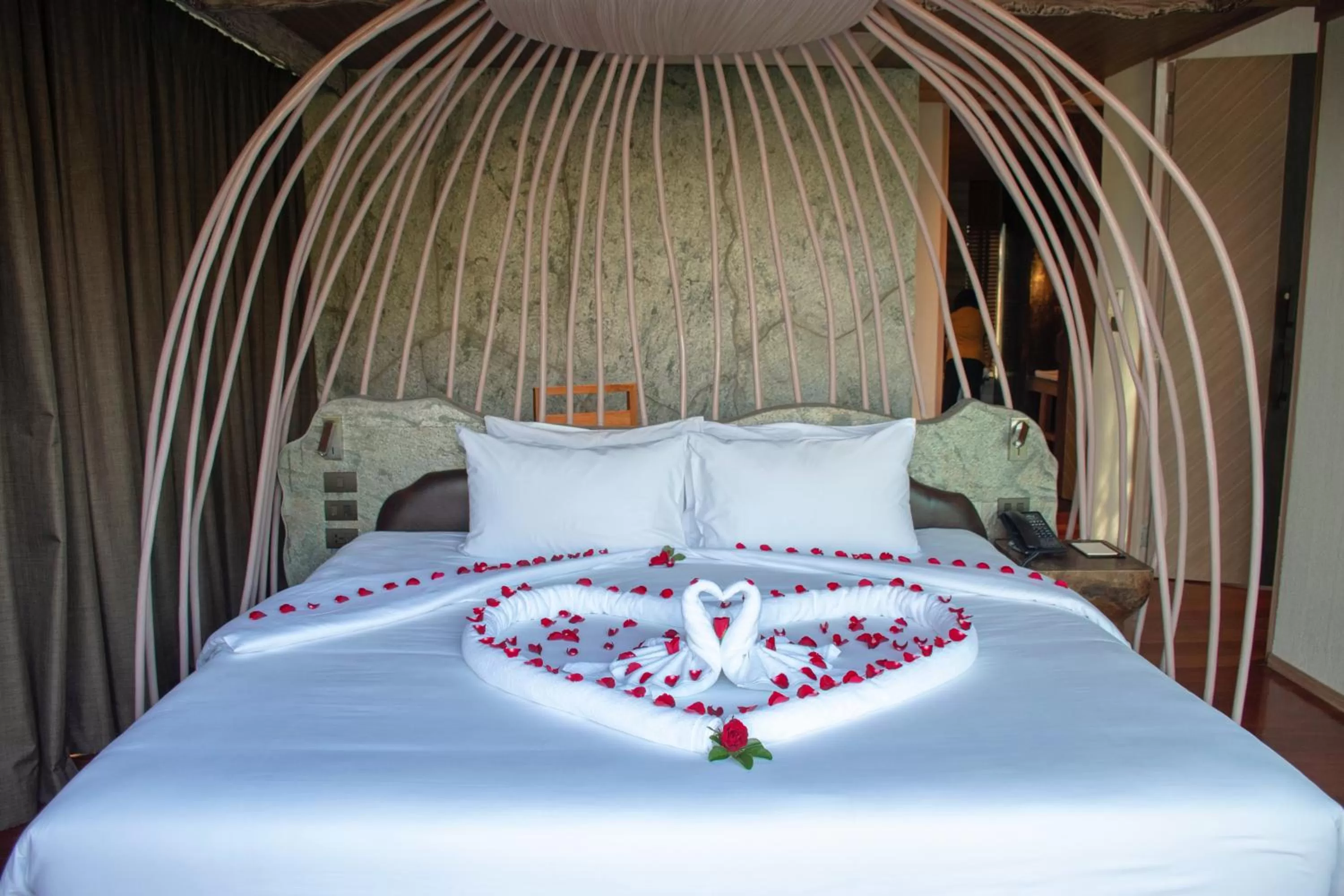 Bed in Kalima Resort and Villas Khao Lak