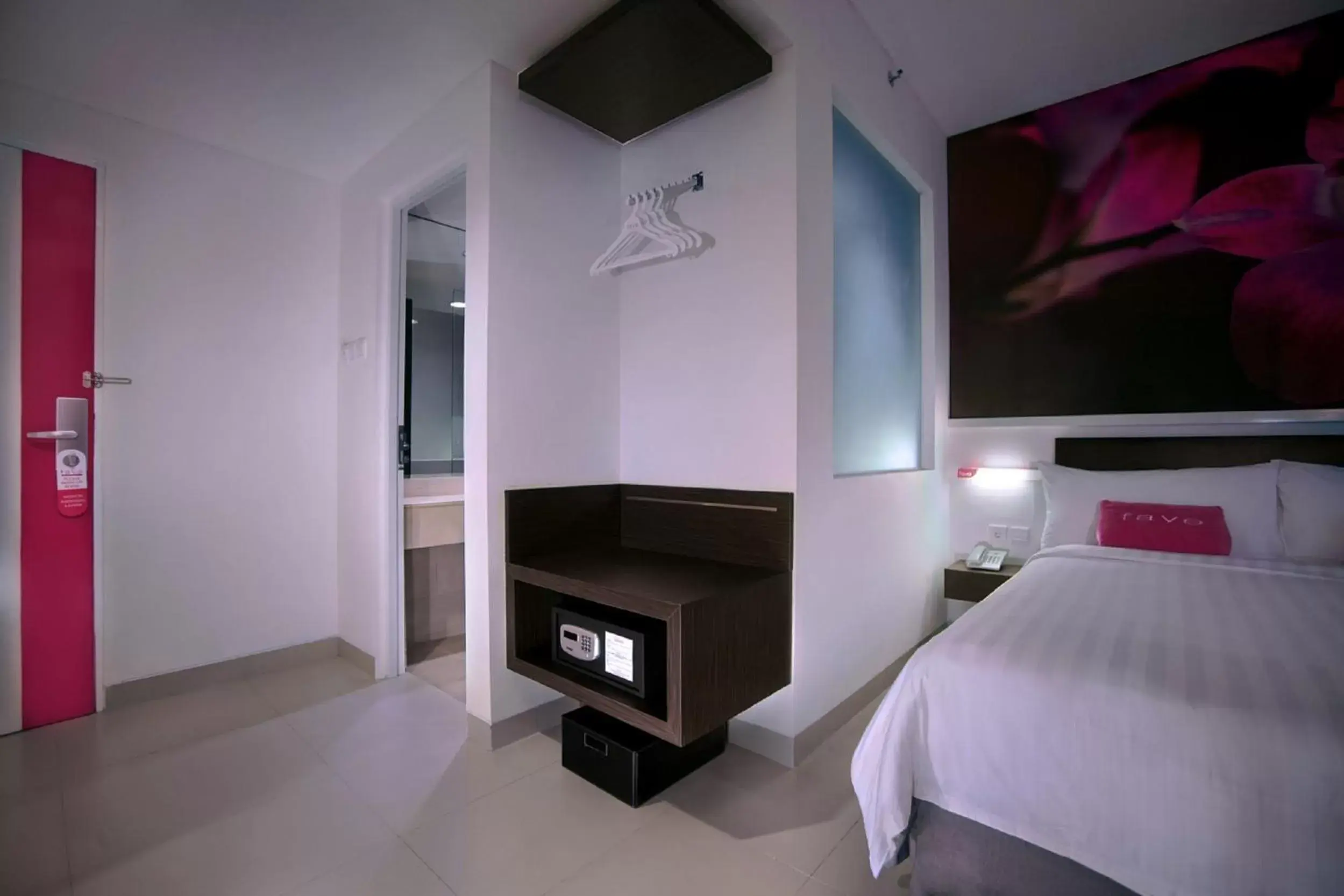 Bedroom, TV/Entertainment Center in favehotel Melawai