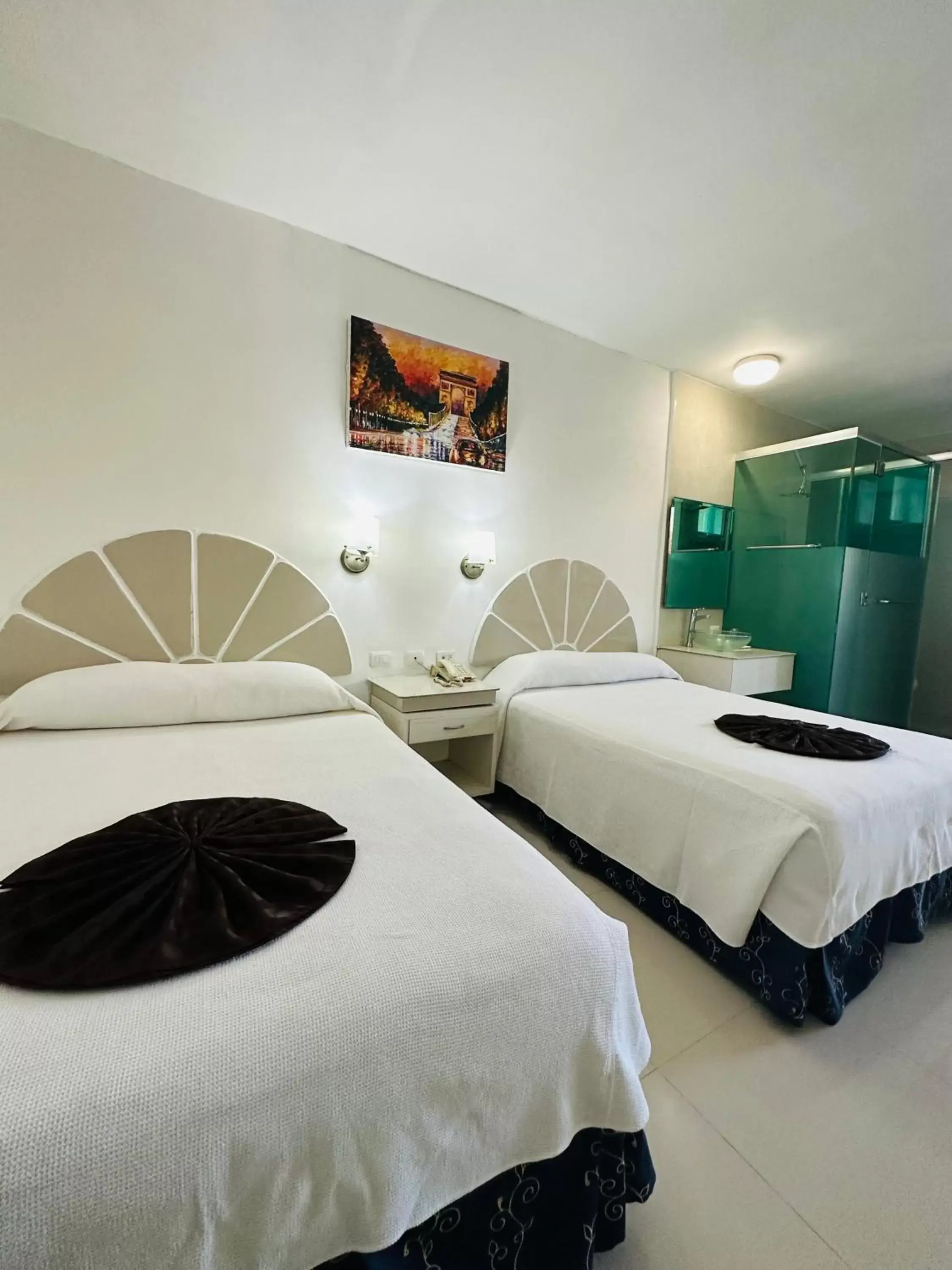 Bed in Hotel Plaza Caribe
