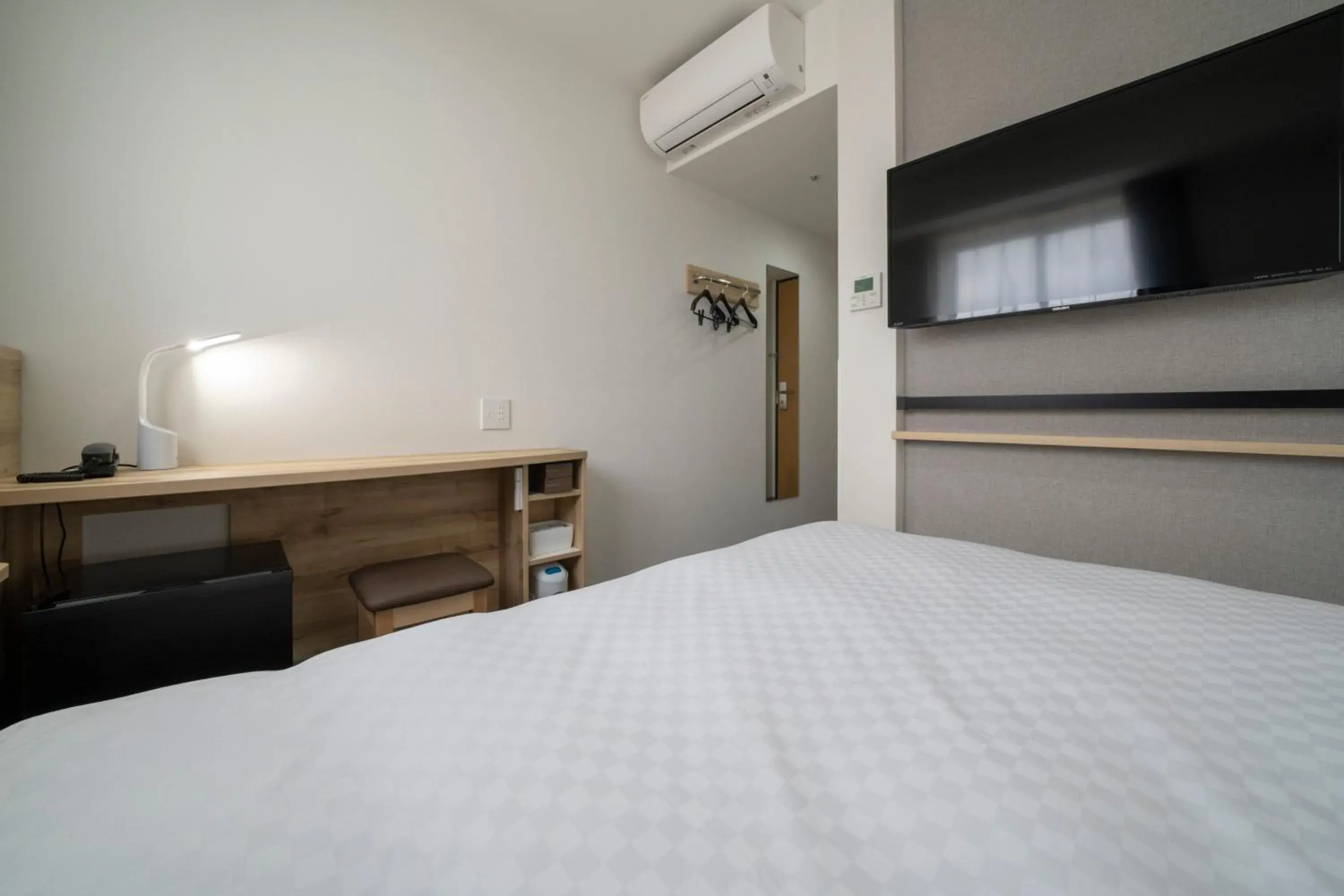 Bed in Washington R&B Hotel Nagoya Shinkansenguchi Bed in Washington R&B Hotel Nagoya Shinkansenguchi