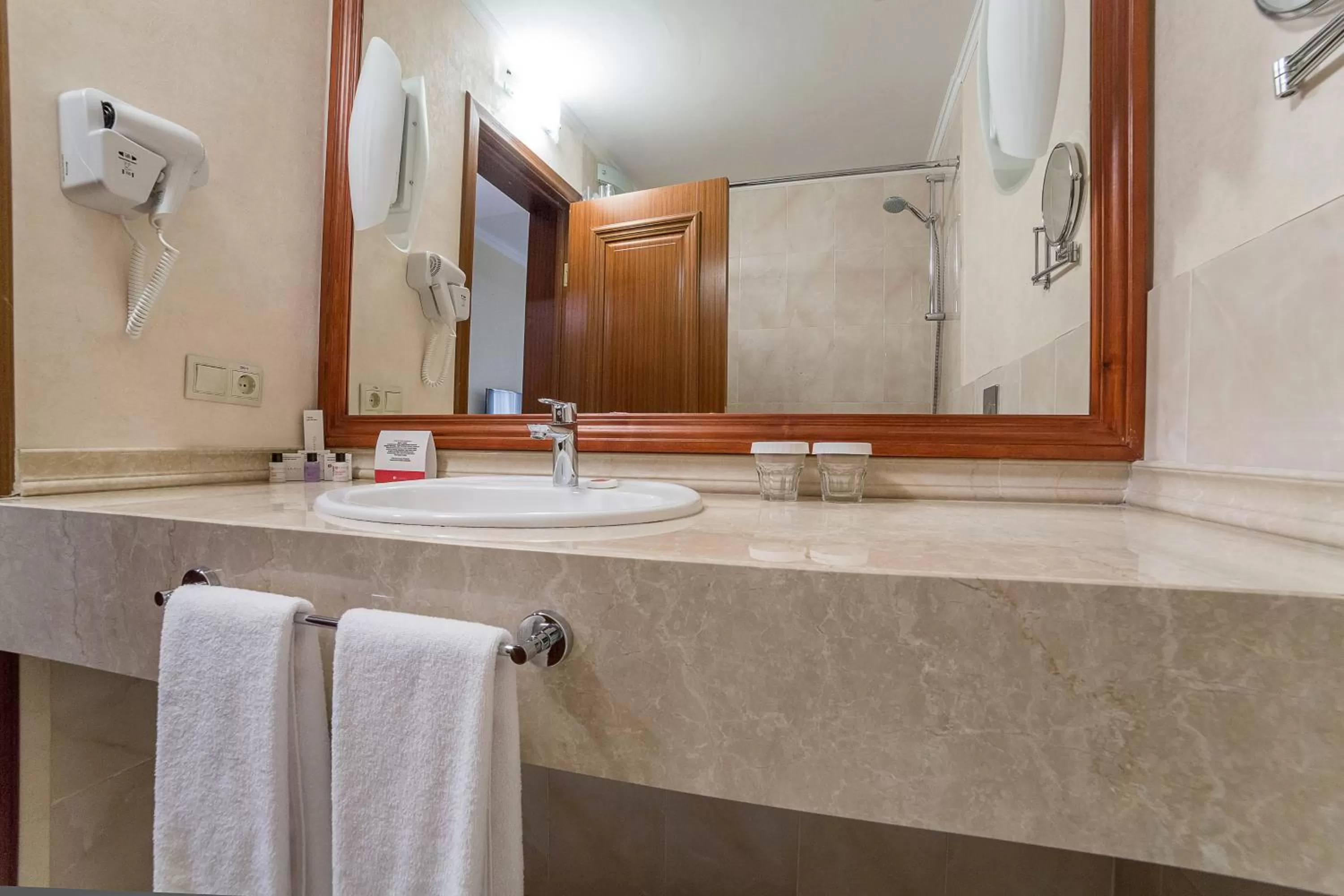 Bathroom in Ramada by Wyndham Almaty