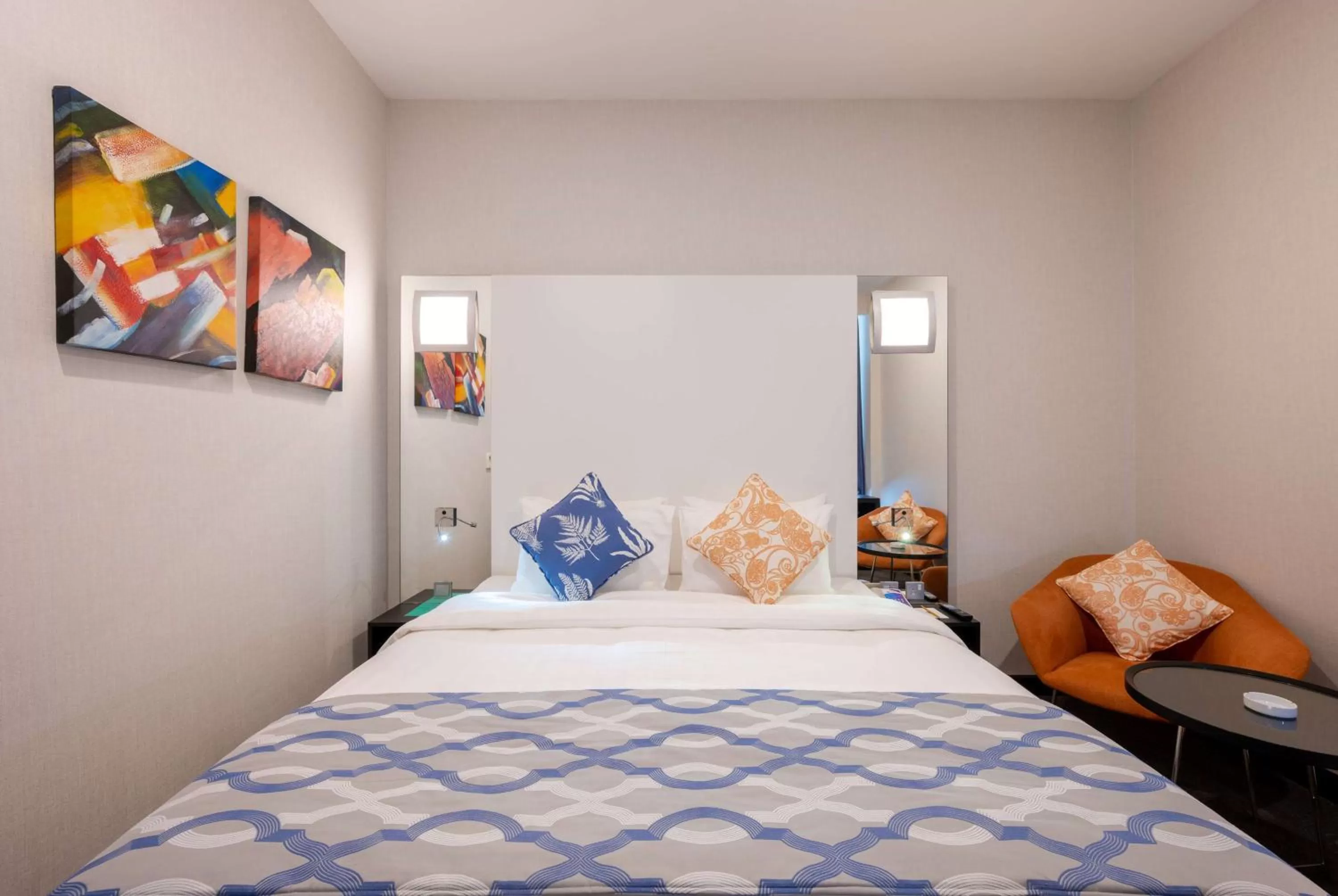 Photo of the whole room, Bed in Ramada Encore Doha by Wyndham