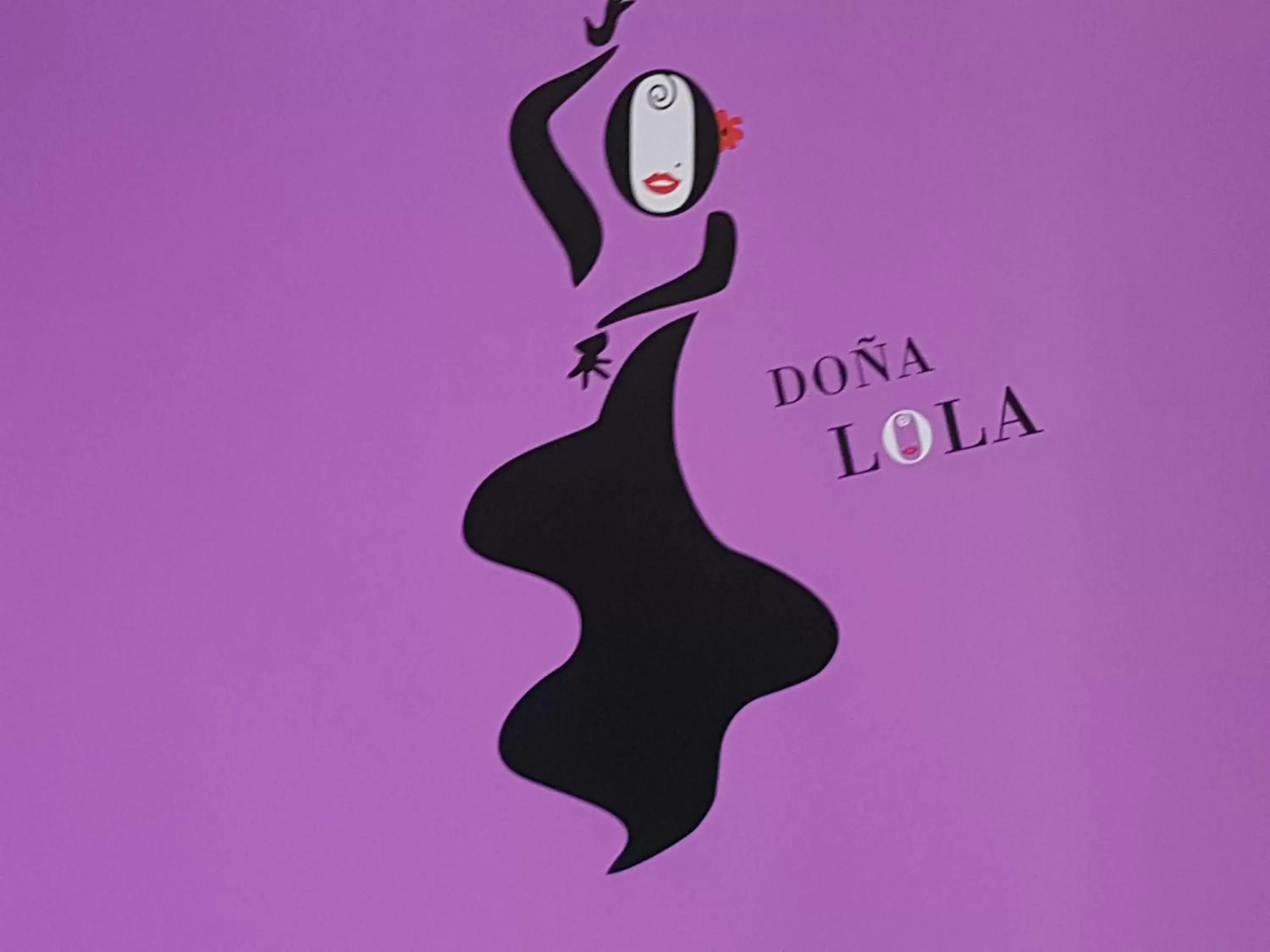 Property logo or sign in Hotel y Apartamentos Doña Lola