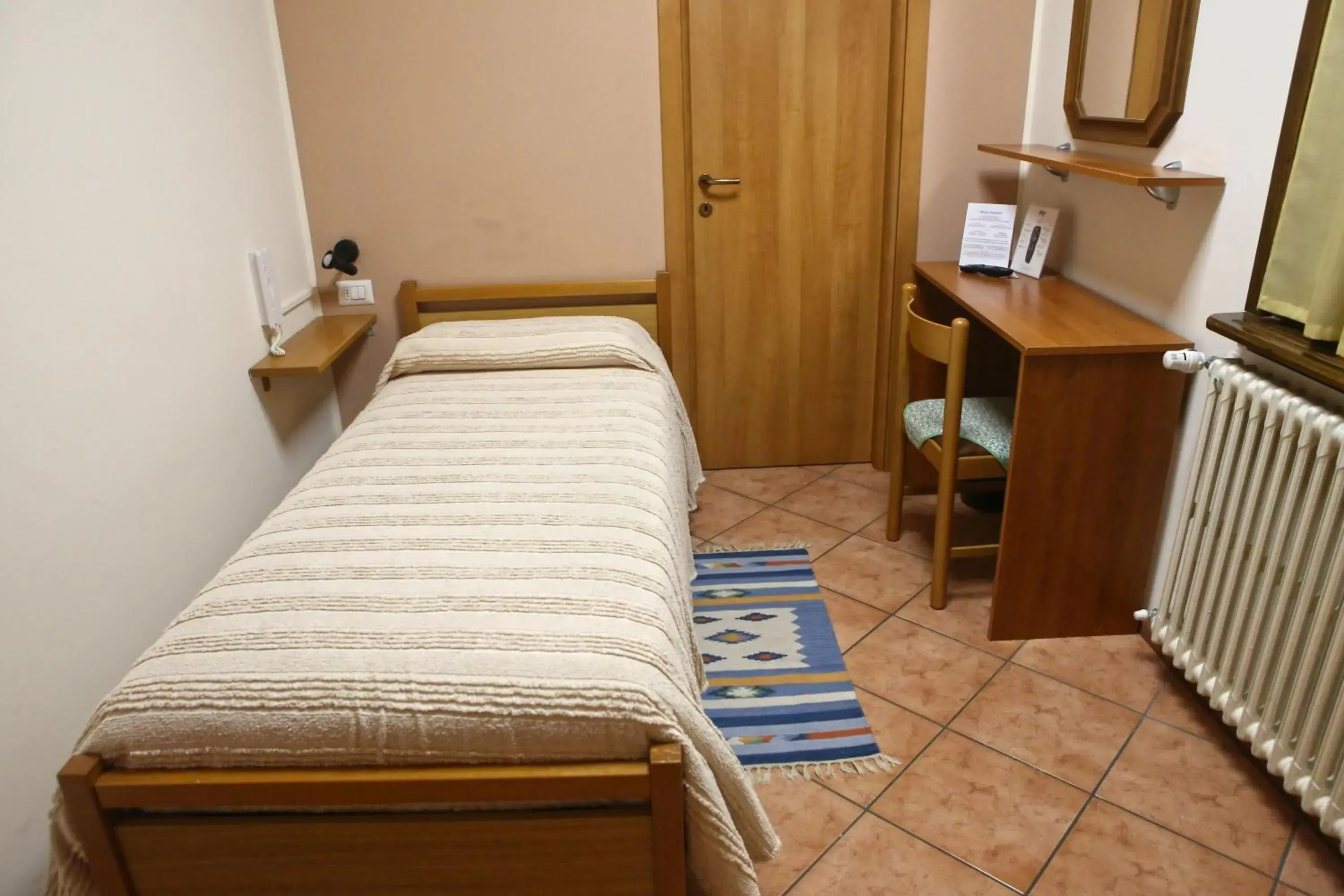 Photo of the whole room, Bed in Albergo Gusmeroli