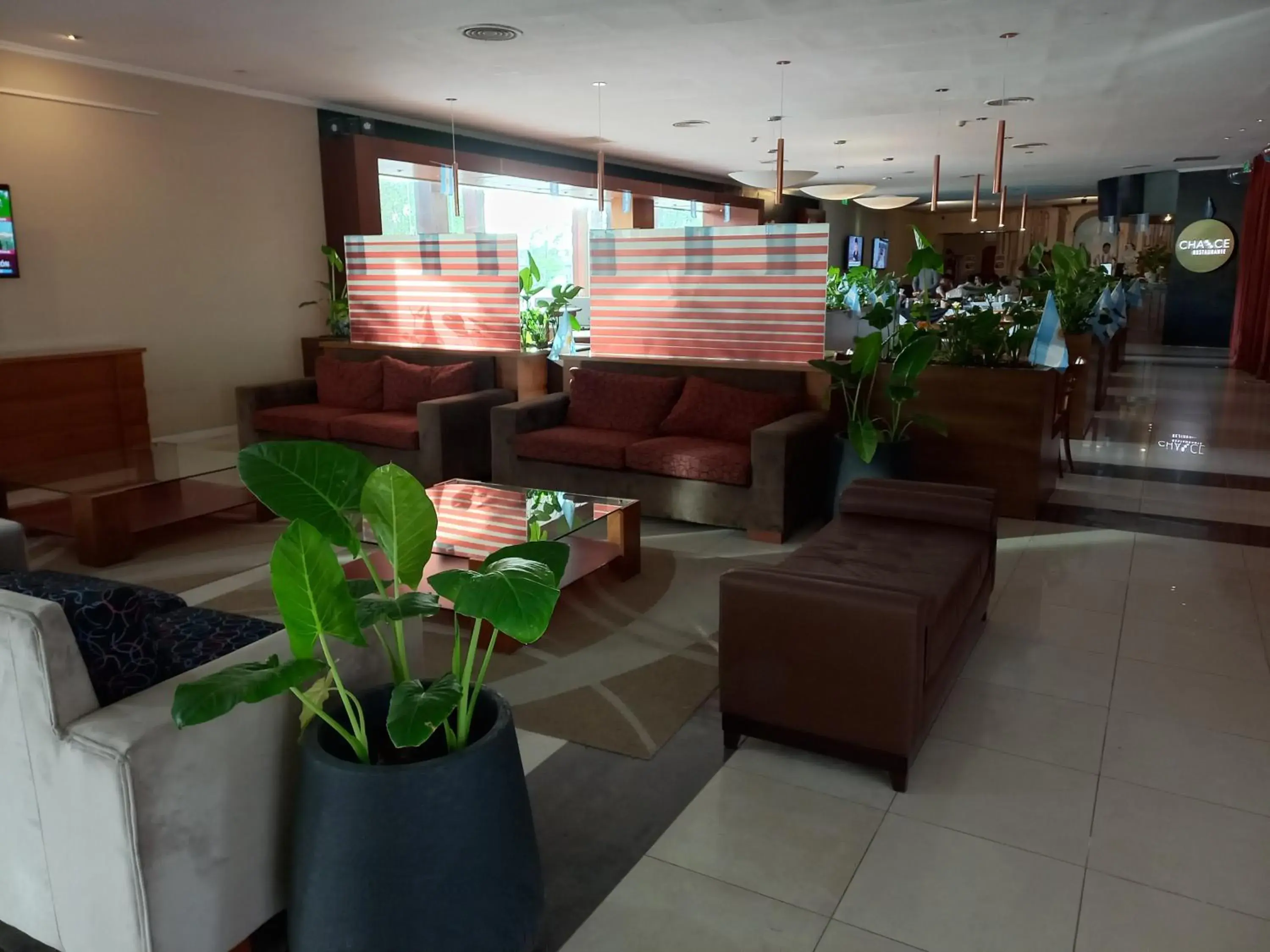 Seating area, Lobby/Reception in Howard Johnson Rio Cuarto Hotel y Casino