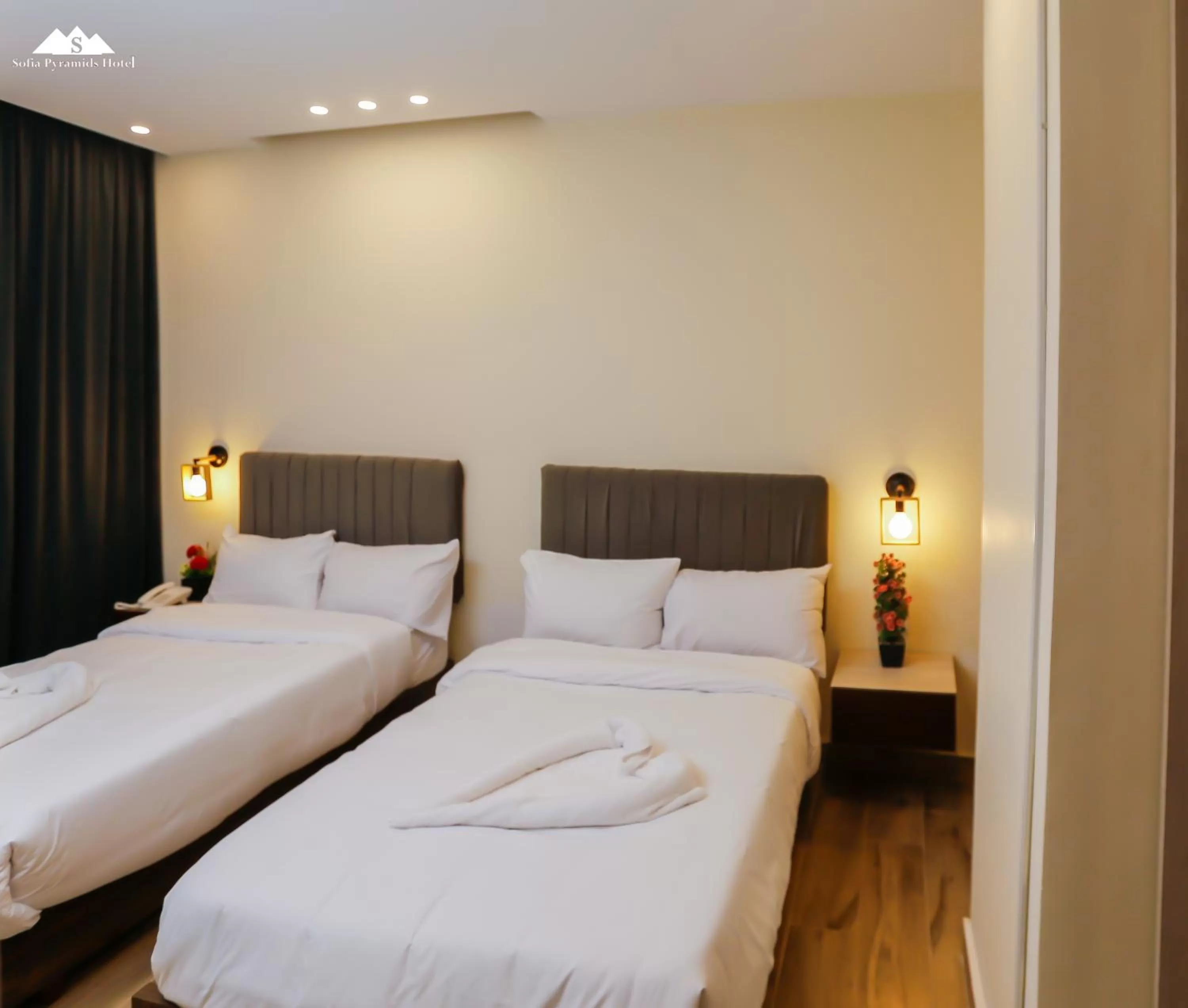 Bed in Sofia Pyramids Hotel