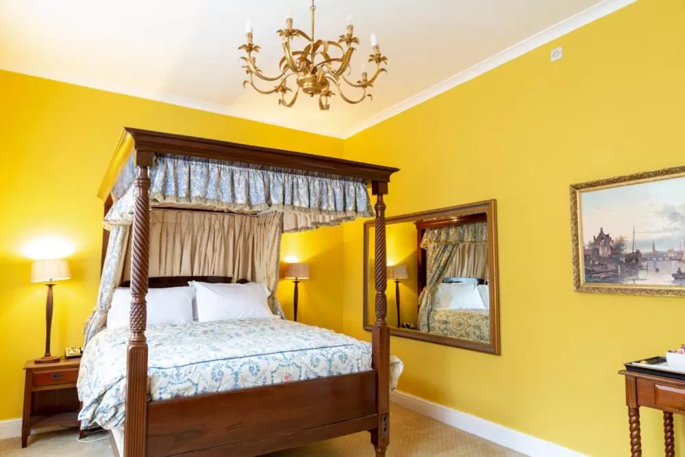 Bed in Angel and Royal Hotel