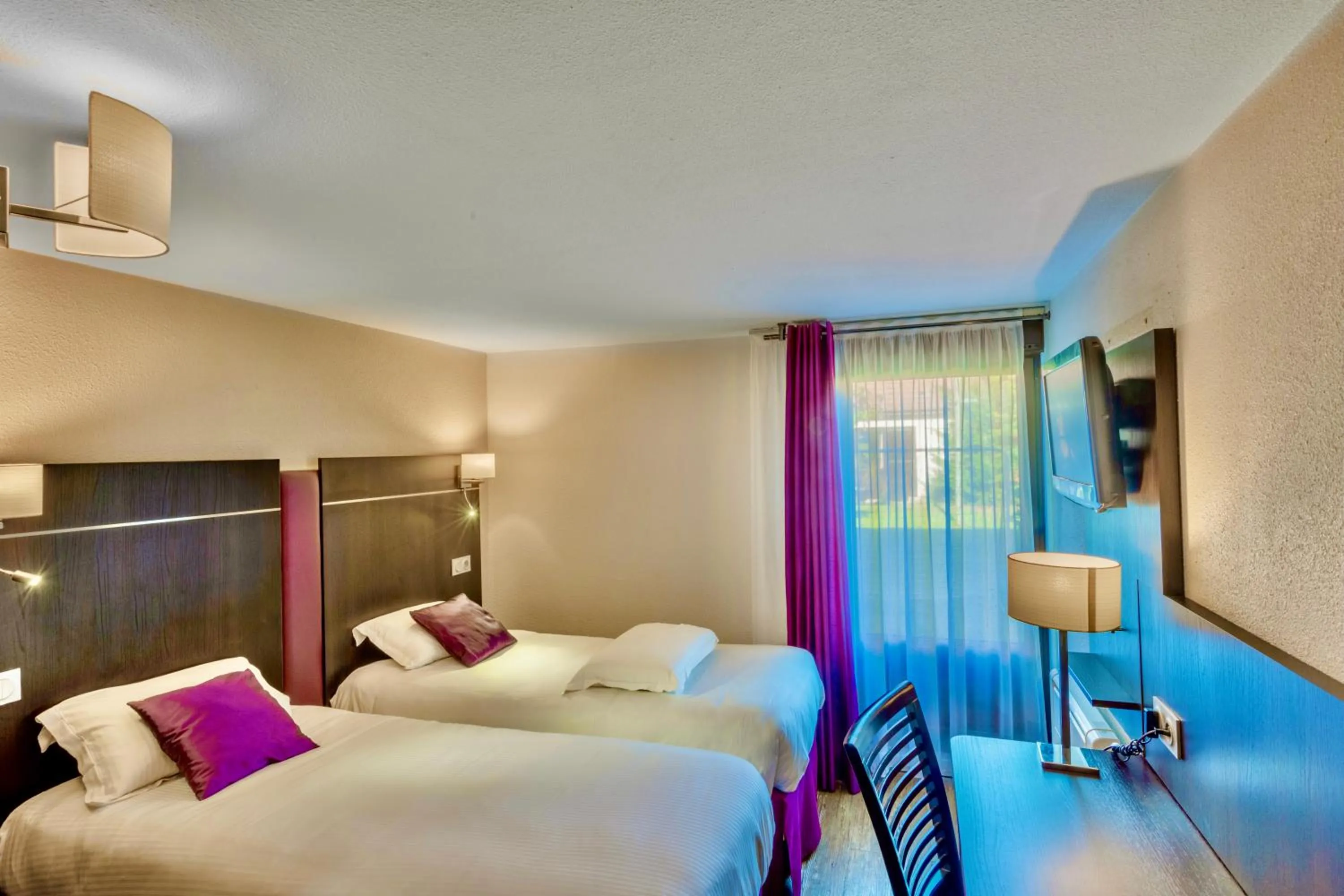 Photo of the whole room, Bed in Kyriad Hotel Meaux