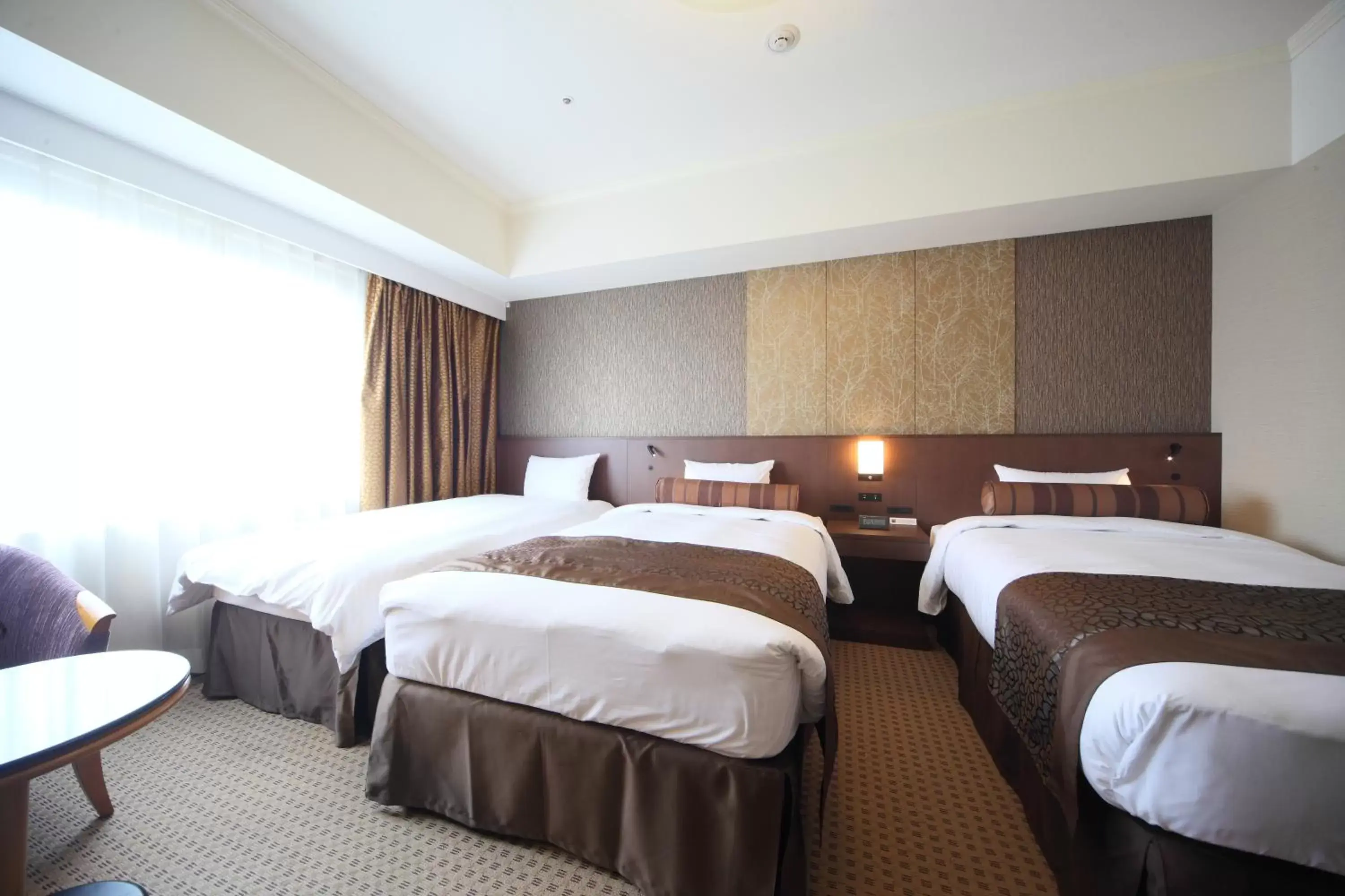 Bed in Hotel Metropolitan Nagano