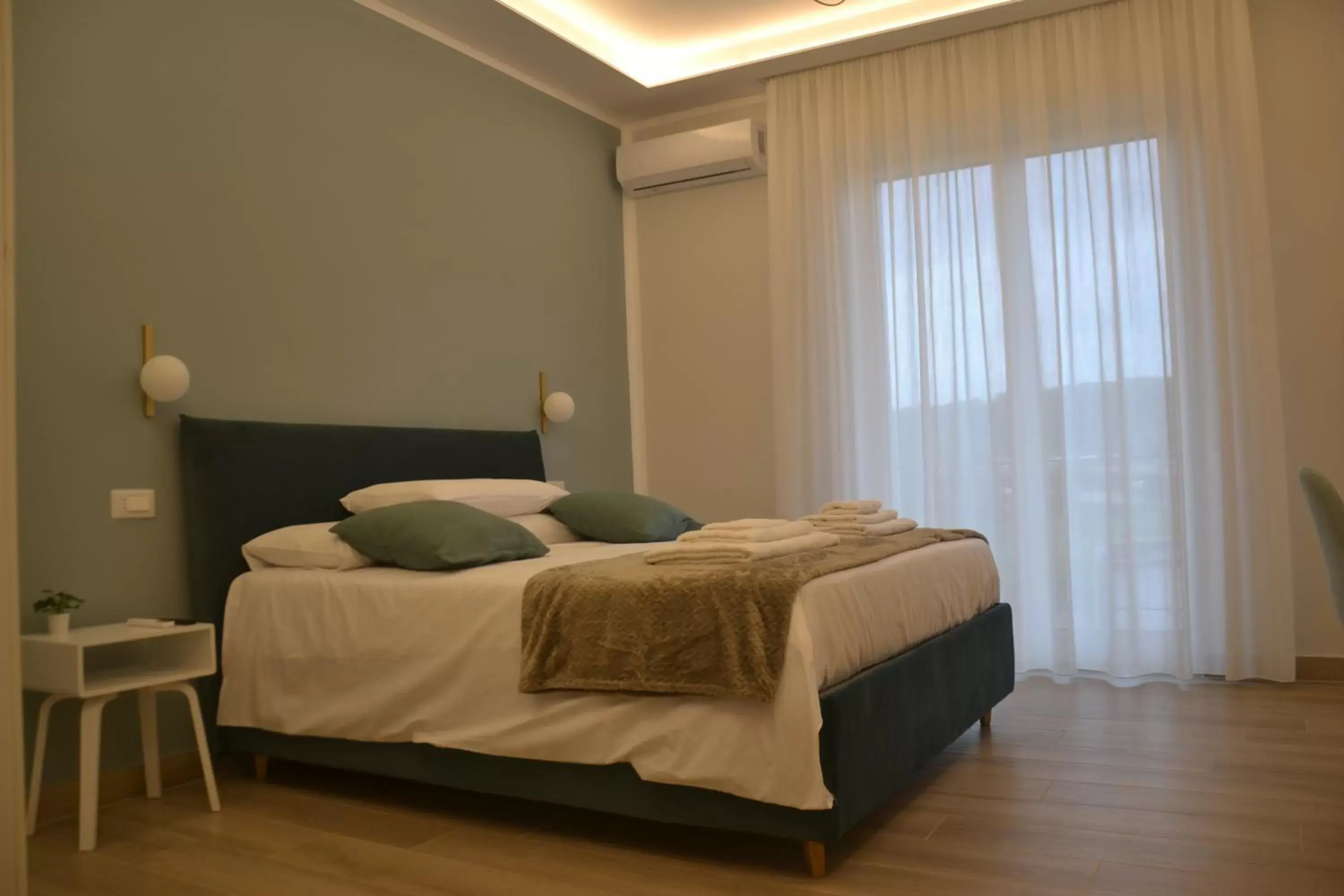 Bed in Luna Nuova Suites